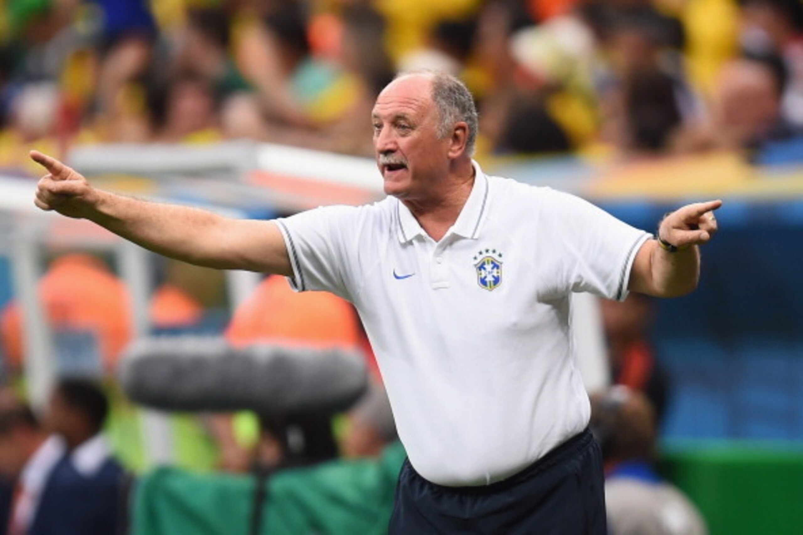 BRASILIA, BRAZIL - JULY 12:  Head coach Luiz Felipe Scolari of Brazil gestures during the 2014 FIFA World Cup Brazil Third Place Playoff match between Brazil and the Netherlands at Estadio Nacional on July 12, 2014 in Brasilia, Brazil.  (Photo by Jamie Mc