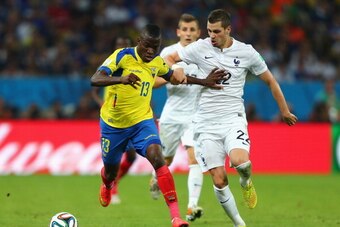 RIO DE JANEIRO, BRAZIL - JUNE 25:  Enner Valencia of Ecuador controls the ball against Morgan Schneiderlin of France during the 2014 FIFA World Cup Brazil Group E match between Ecuador and France at Maracana on June 25, 2014 in Rio de Janeiro, Brazil.  (P