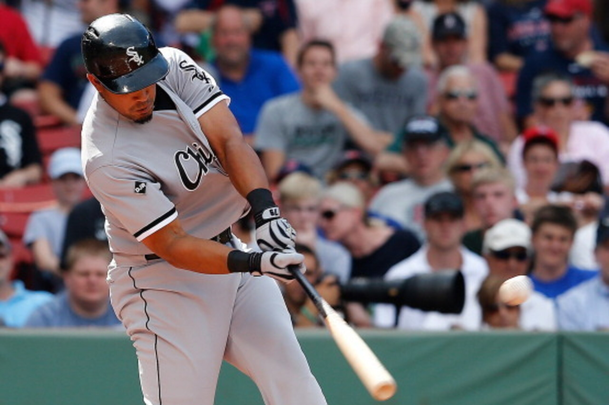 BOSTON, MA - JULY 10: Jose Abreu #79 of the Chicago White Sox knocks in a run in the first inning against Boston Red Sox at Fenway Park on July 10, 2014 in Boston, Massachusetts. (Photo by Jim Rogash/Getty Images)