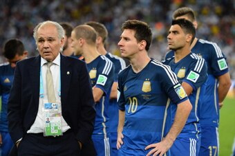 RIO DE JANEIRO, BRAZIL - JULY 13: Head coach Alejandro Sabella of Argentina looks on with Lionel Messi after being defeated by Germany 1-0 in extra time during the 2014 FIFA World Cup Brazil Final match between Germany and Argentina at Maracana on July 13