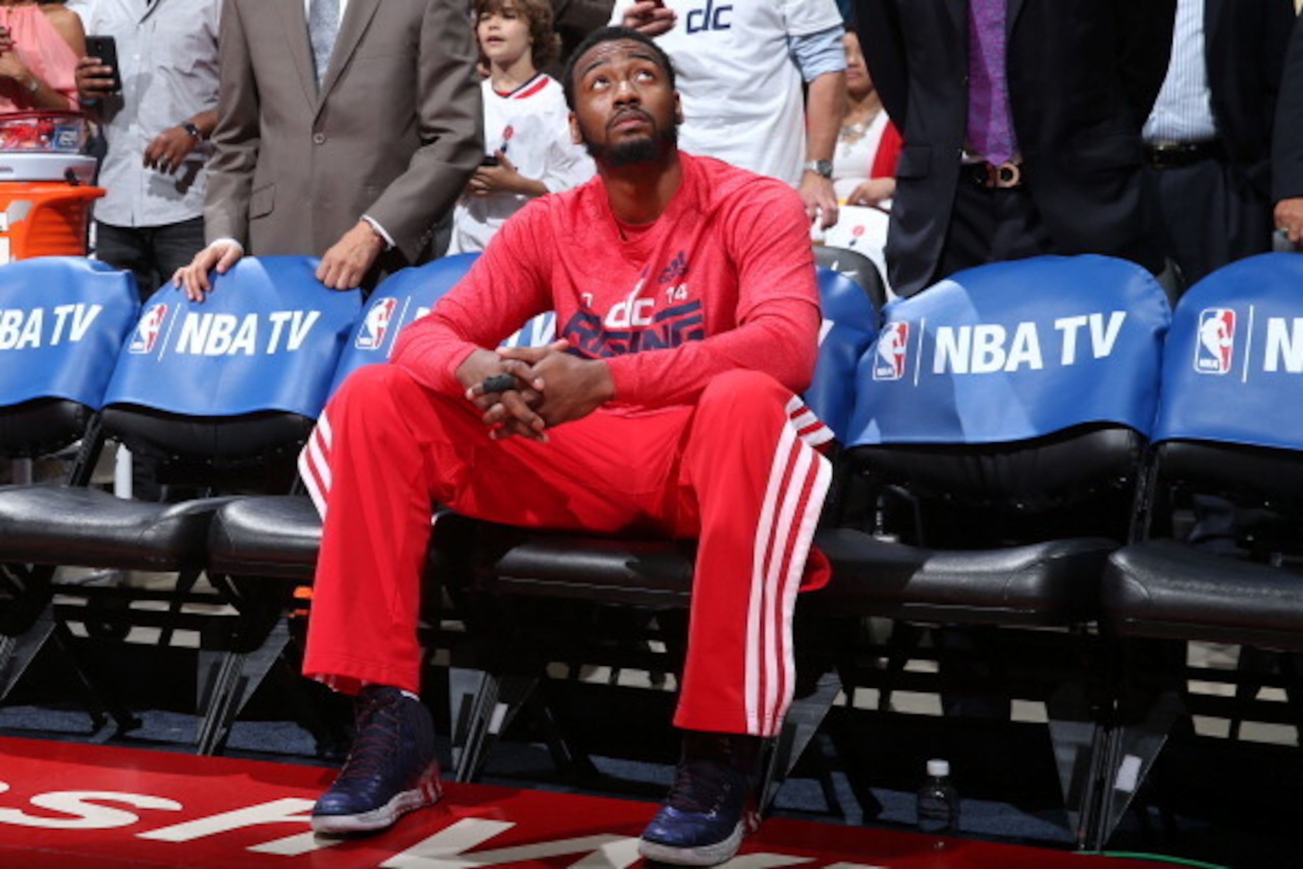 WASHINGTON, DC - MAY 15:  John Wall #2 of the Washington Wizards sits on the bench before the game against the Indiana Pacers in Game Six of the Eastern Conference Semifinals during the 2014 NBA Playoffs at the Verizon Center on May 15, 2014 in Washington