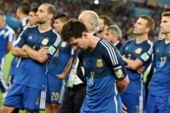 July 13, 2014; Rio de Janeiro, BRAZIL; Argentina forward Lionel Messi (10) reacts after the championship match of the 2014 World Cup after the game at Maracana Stadium. Germany won 1-0.  Mandatory Credit: Tim Groothuis/Witters Sport via USA TODAY Sports