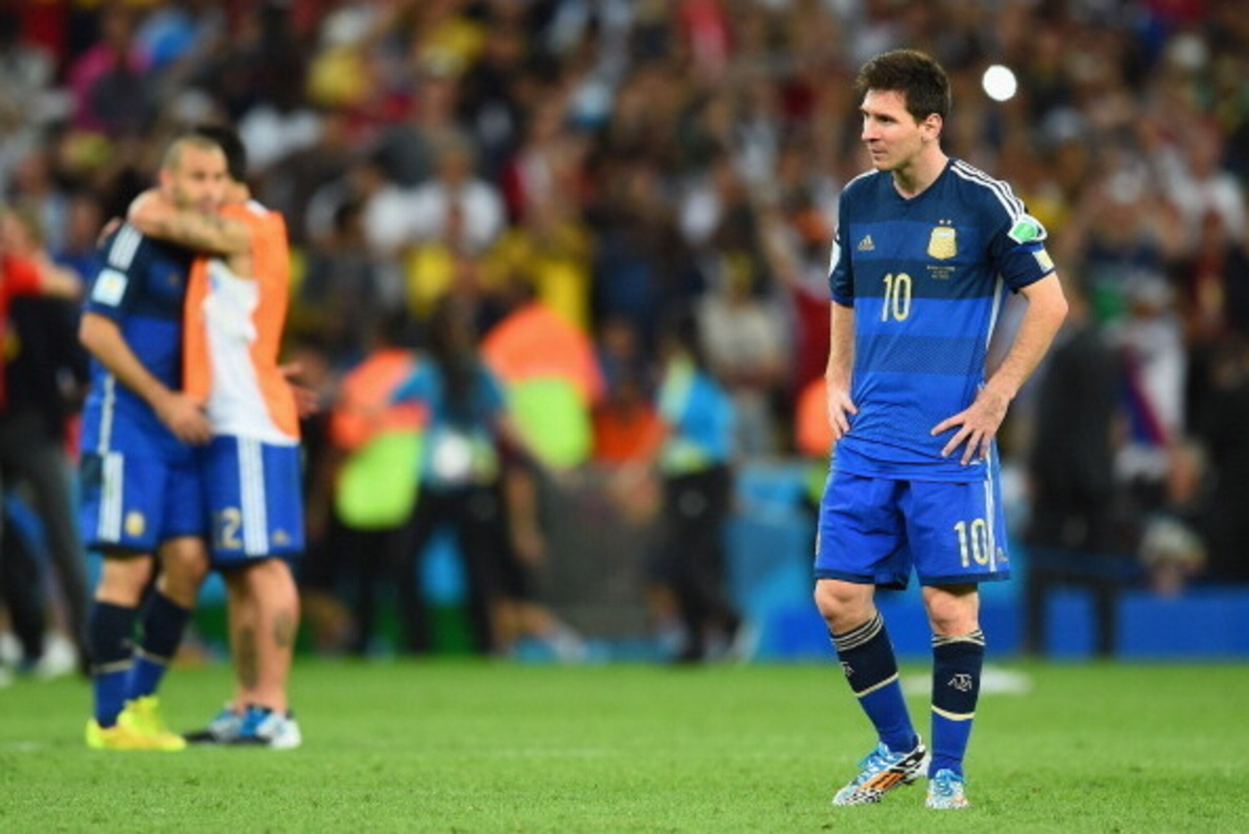 RIO DE JANEIRO, BRAZIL - JULY 13: A dejected Lionel Messi of Argentina looks on after being defeated by Germany 1-0 in extra time during the 2014 FIFA World Cup Brazil Final match between Germany and Argentina at Maracana on July 13, 2014 in Rio de Janeir