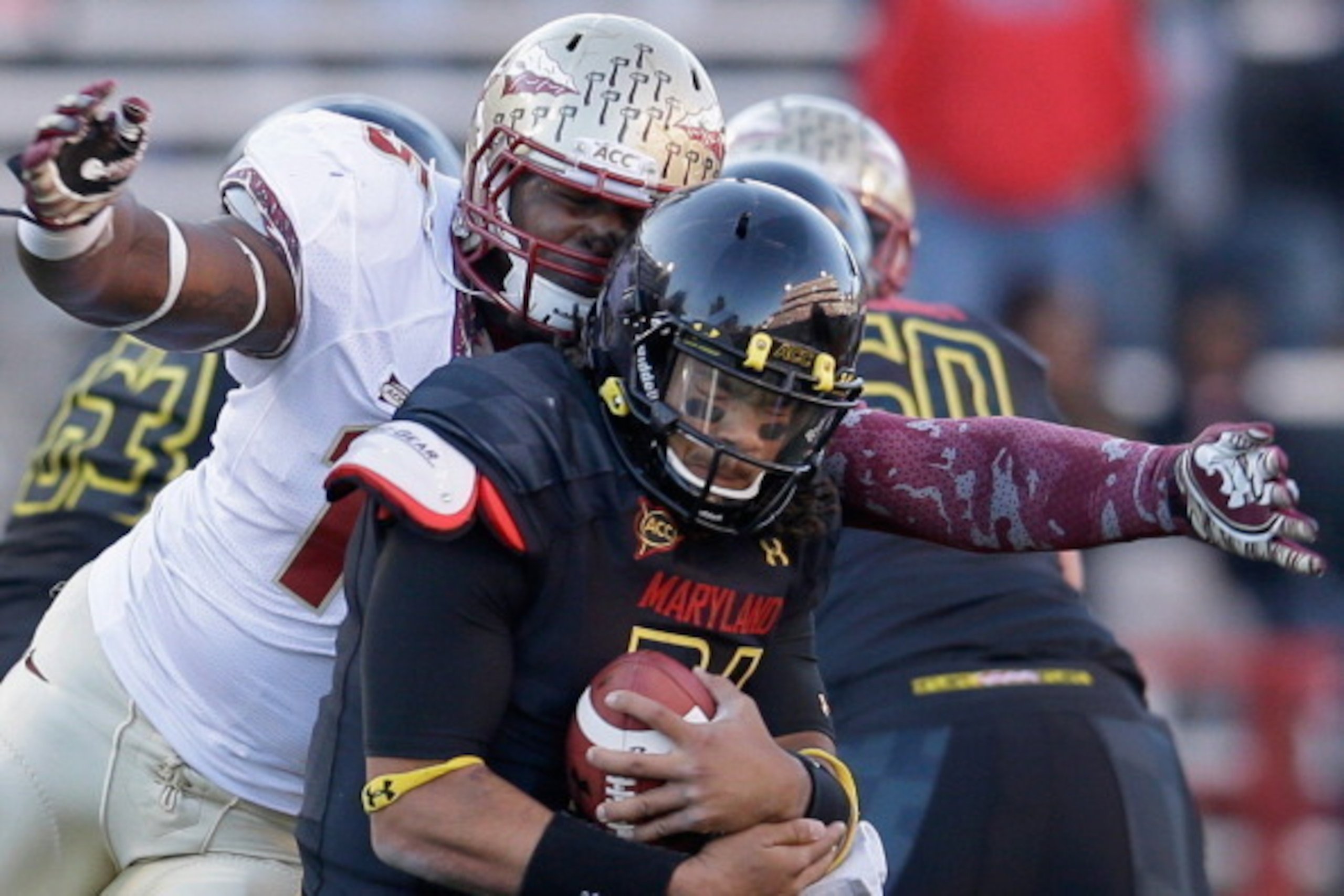COLLEGE PARK, MD - NOVEMBER 17: Defensive end Mario Edwards Jr. #15 of the Florida State Seminoles sacks quarterback Shawn Petty #31 of the Maryland Terrapins during the fourth quarter of the Seminoles 41-14 win at Byrd Stadium on November 17, 2012 in Col