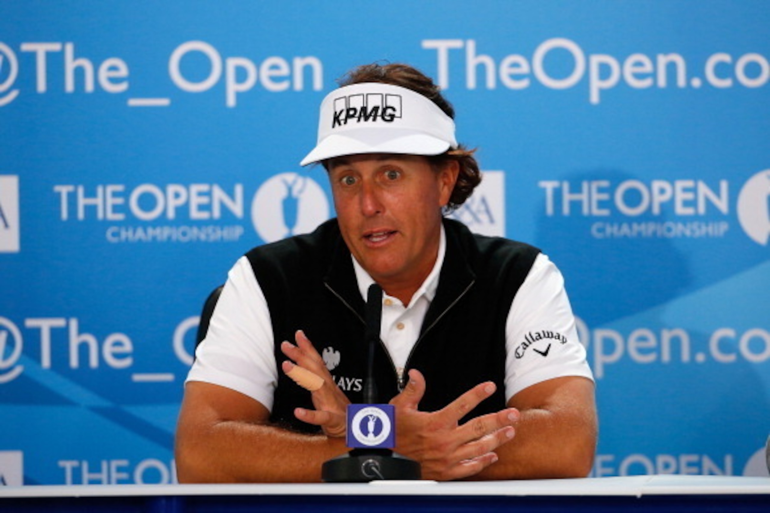 HOYLAKE, ENGLAND - JULY 14:  Phil Mickelson of the United States speaks with the media during a practice round prior to the start of the 143rd Open Championship at Royal Liverpool on July 14, 2014 in Hoylake, England.  (Photo by Tom Pennington/Getty Image