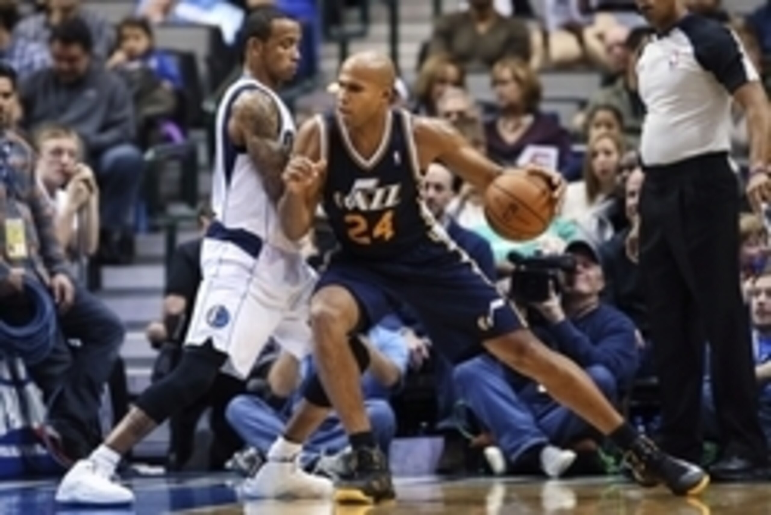 Nov 22, 2013; Dallas, TX, USA; Utah Jazz small forward Richard Jefferson (24) dribbles on Dallas Mavericks shooting guard Monta Ellis (11) during the game at American Airlines Center. Dallas won 103-93.  Mandatory Credit: Kevin Jairaj-USA TODAY Sports