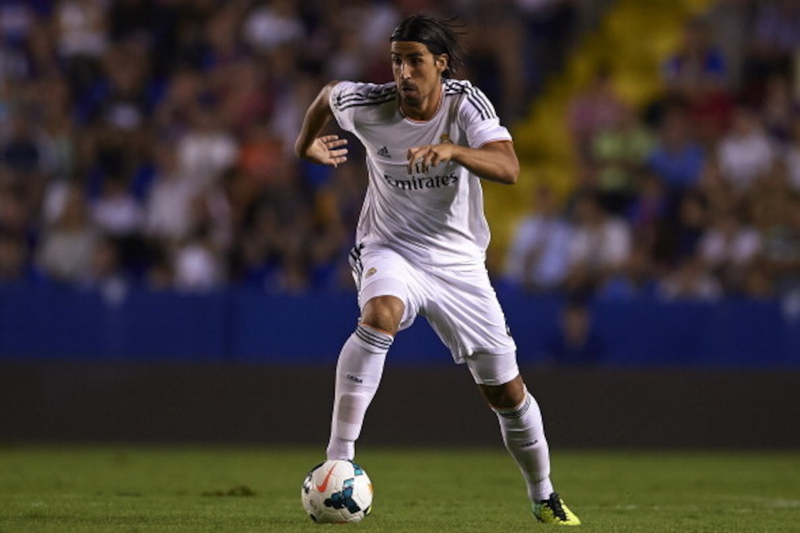 VALENCIA, SPAIN - OCTOBER 05:  Sami Khedira of Real Madrid runs with the ball during the La Liga match between Levante UD and Real Madrid at Ciutat de Valencia on October 5, 2013 in Valencia, Spain.  (Photo by Manuel Queimadelos Alonso/Getty Images)