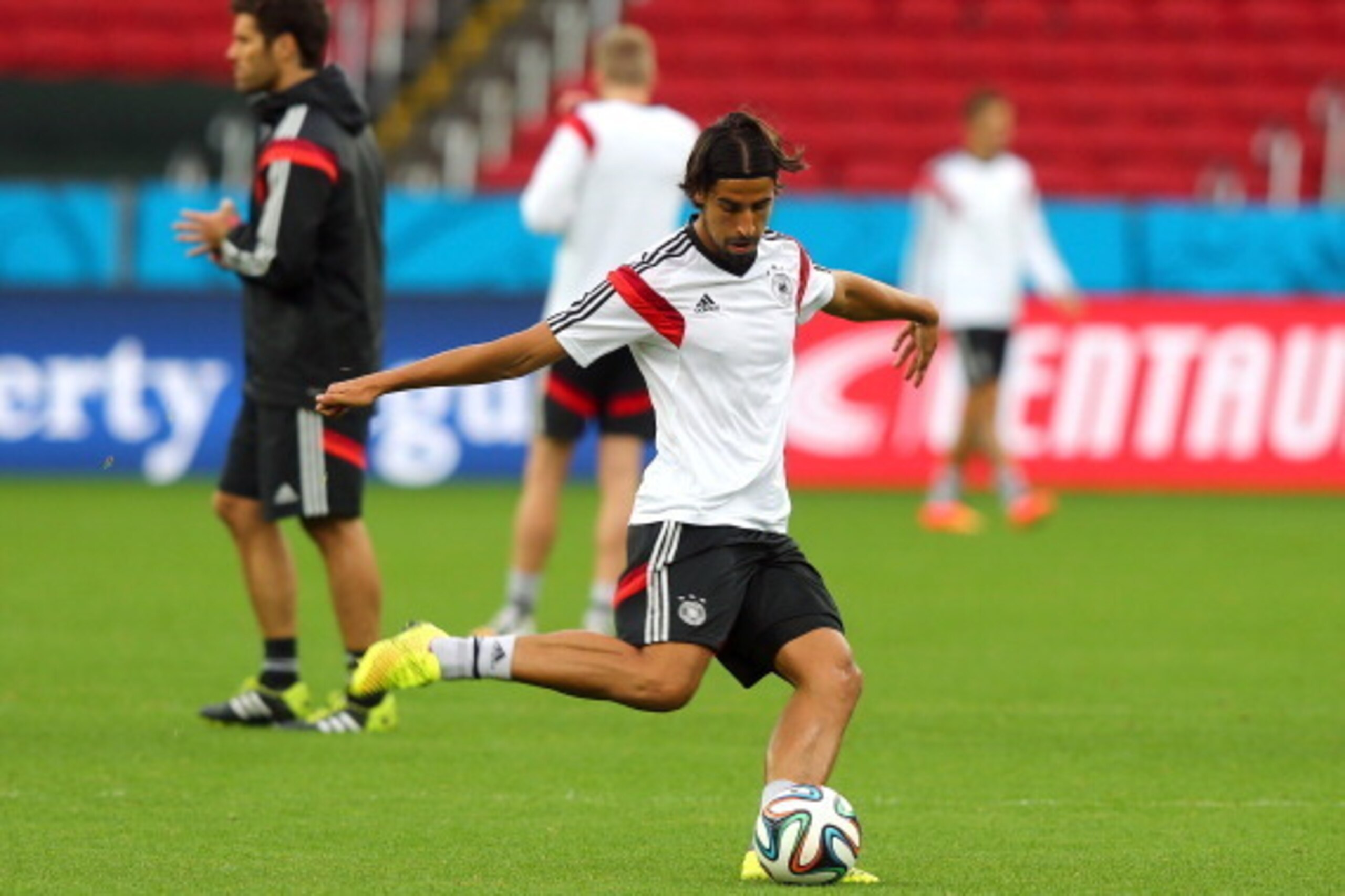 PORTO ALEGRE, BRAZIL - JUNE 29: Sami Khedira of Germany shoots the ball during the German national team training at Estadio Beira-Rio on June 29, 2014 in Porto Alegre, Brazil.  (Photo by Martin Rose/Getty Images)