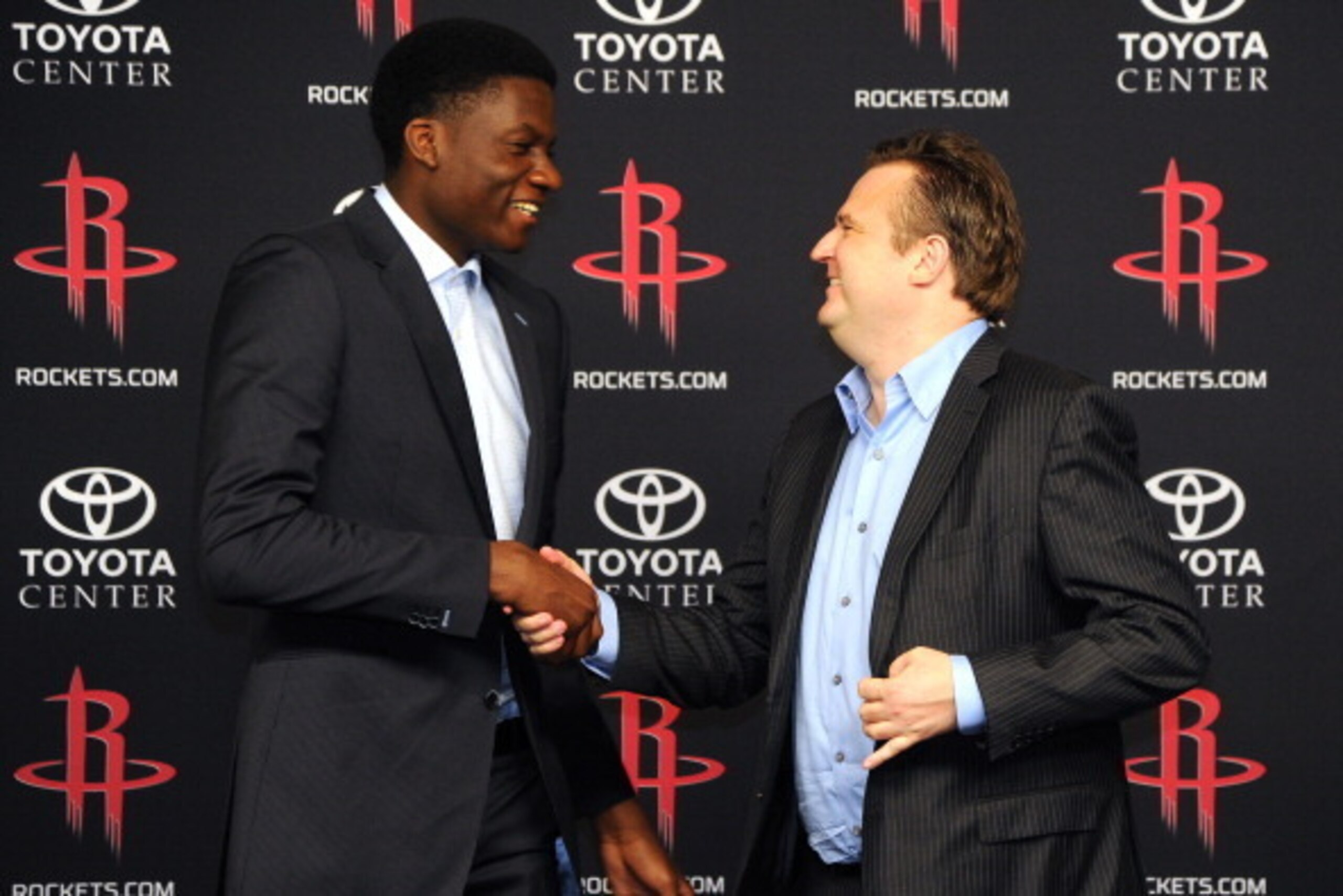 HOUSTON - June 30:  Houston Rockets GM Daryl Morey shakes hands with the Rockets draft pick Clint Capela #15 during a press conference in Houston, Texas. NOTE TO USER: User expressly acknowledges and agrees that, by downloading and or using this photograp
