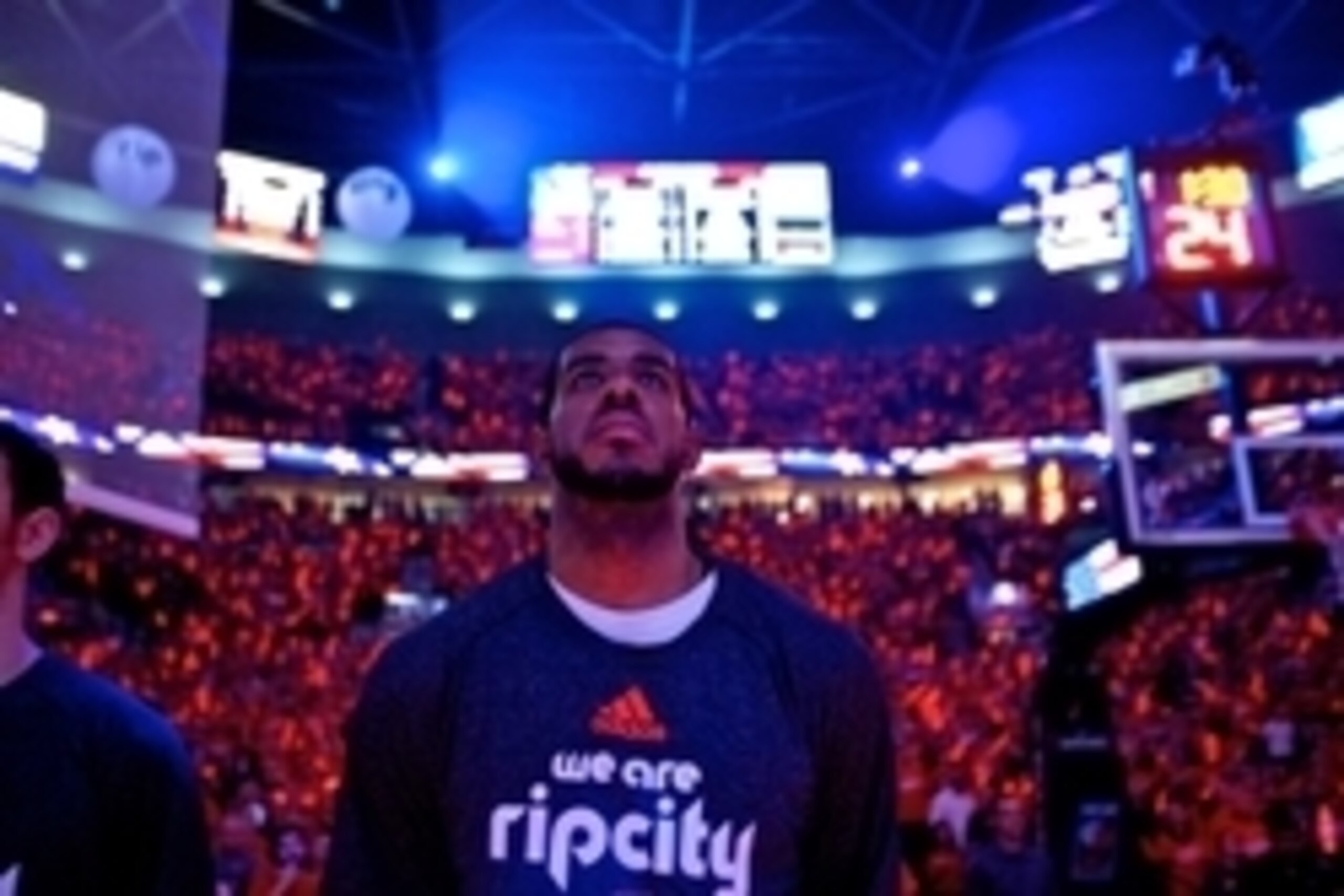 May 10, 2014; Portland, OR, USA; Portland Trail Blazers forward LaMarcus Aldridge (12) looks up during pre game introductions in game three of the second round of the 2014 NBA Playoffs against the San Antonio Spurs at the Moda Center. Mandatory Credit: Cr