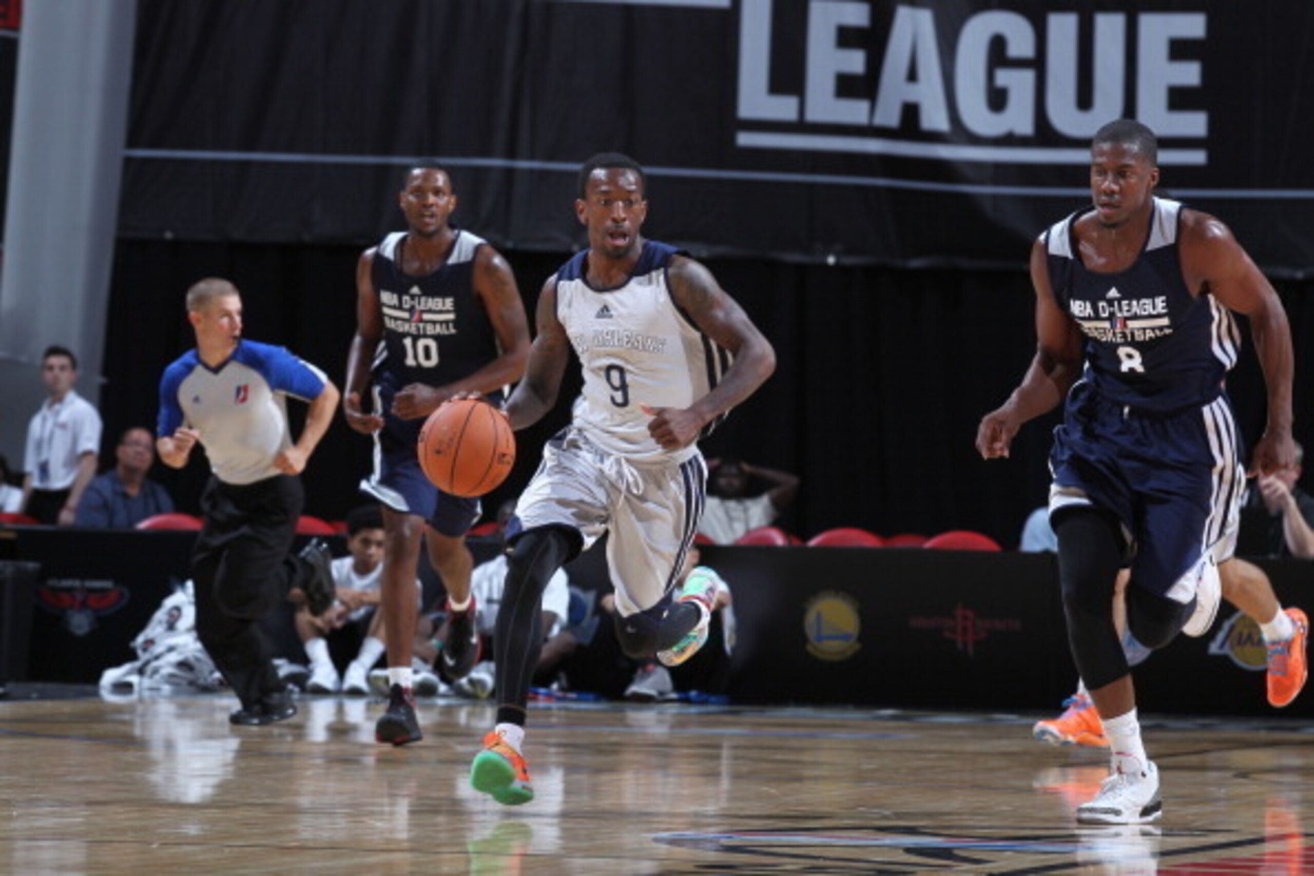 LAS VEGAS, NV - JULY 11: Russ Smith #9 of the New Orleans Pelicans moves the ball up-court against the D-League Select on July 11, 2014 at Thomas & Mack in Las Vegas, Nevada. NOTE TO USER: User expressly acknowledges and agrees that, by downloading and o LAS VEGAS, NV - JULY 11: Russ Smith #9 of the New Orleans Pelicans moves the ball up-court against the D-League Select on July 11, 2014 at Thomas & Mack in Las Vegas, Nevada. NOTE TO USER: User expressly acknowledges and agrees that, by downloading and o