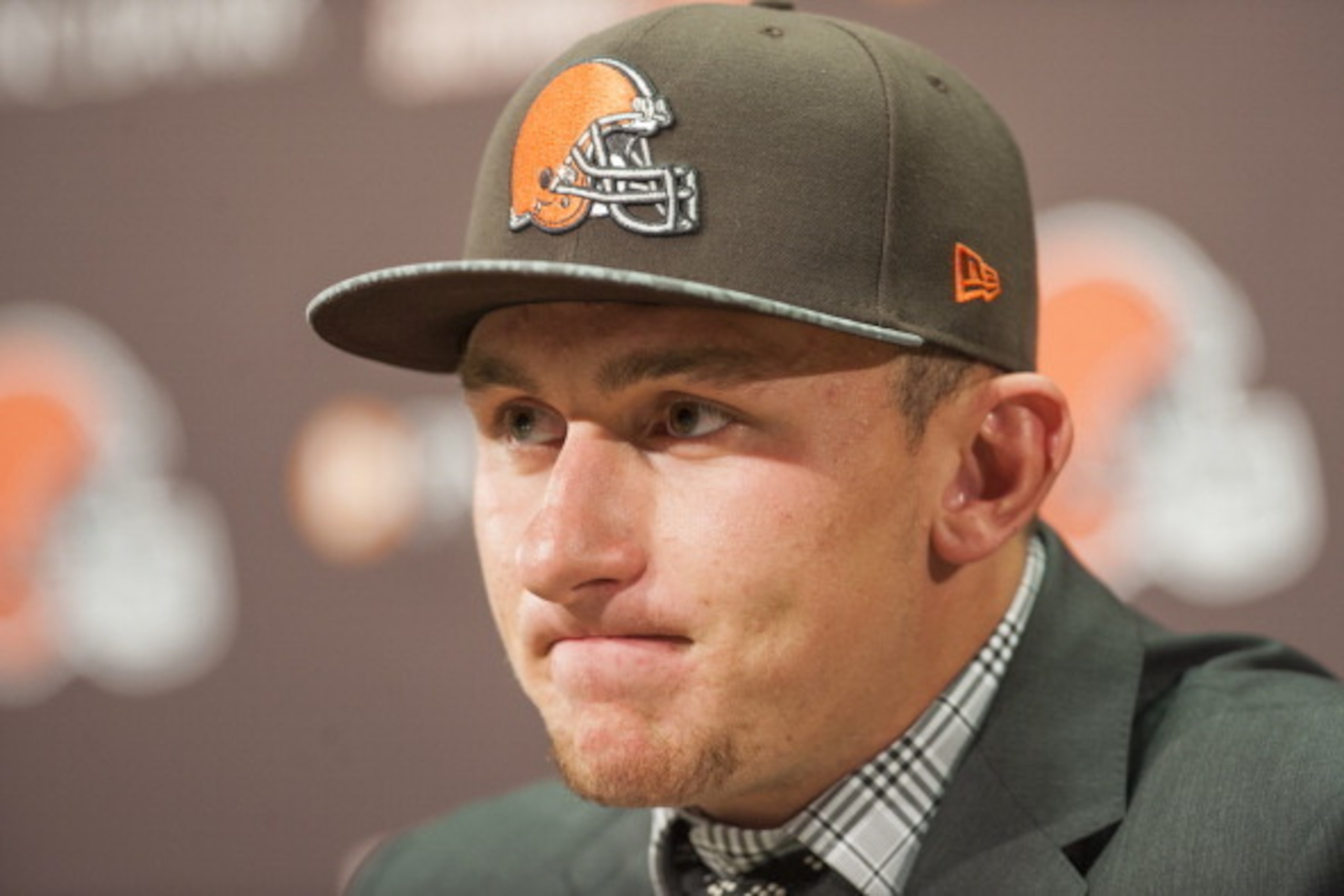 BEREA, OH - MAY 9: Cleveland Browns draft pick Johnny Manziel answers questions during a press conference at the Browns training facility on May 9, 2014 in Cleveland, Ohio. Manziel was selected in the first round with the 22nd pick. (Photo by Jason Miller BEREA, OH - MAY 9: Cleveland Browns draft pick Johnny Manziel answers questions during a press conference at the Browns training facility on May 9, 2014 in Cleveland, Ohio. Manziel was selected in the first round with the 22nd pick. (Photo by Jason Miller