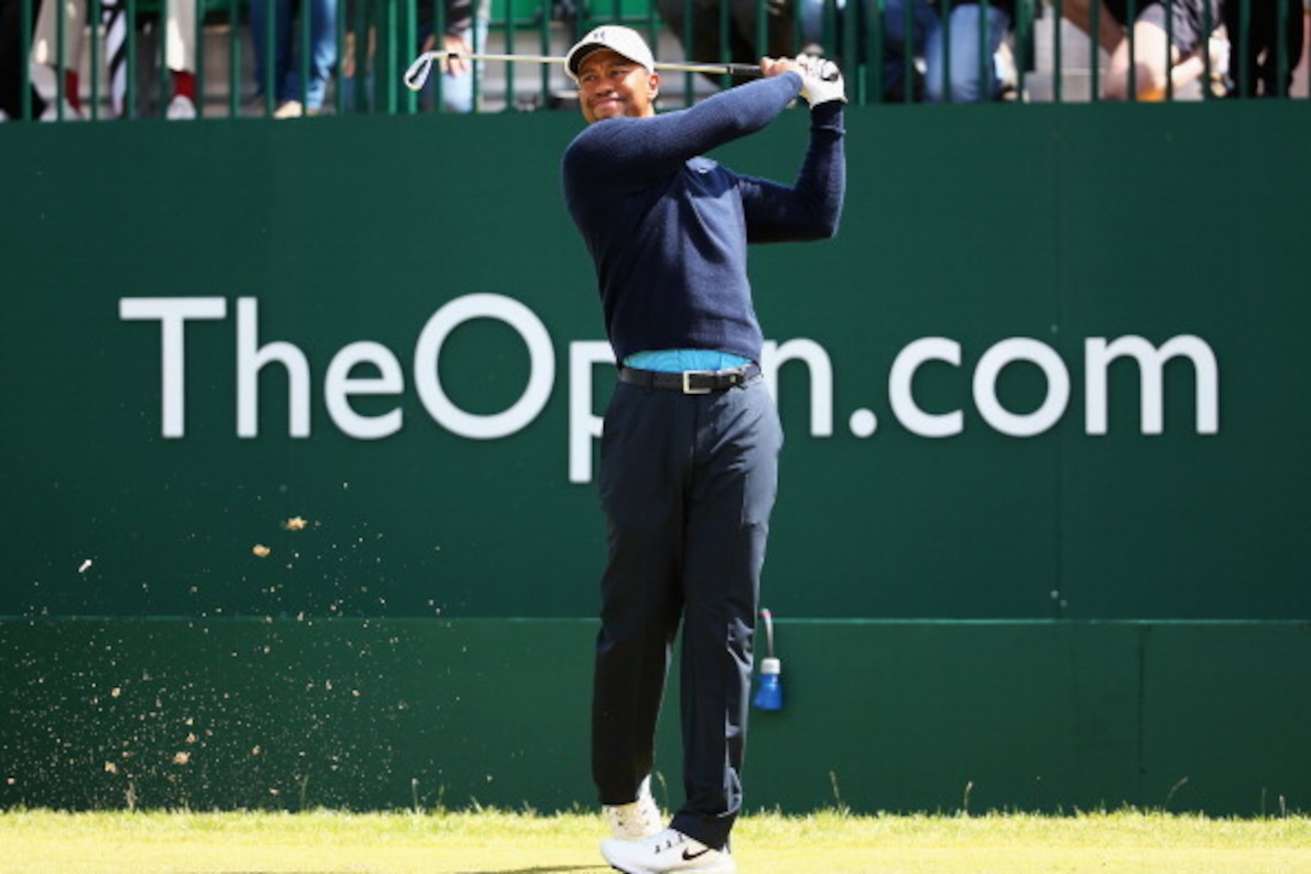 HOYLAKE, ENGLAND - JULY 13:  Tiger Woods of the USA tees off on the 1st hole during a practice round ahead of the 143rd Open Championship at Royal Liverpool on July 13, 2014 in Hoylake, England.  (Photo by Matthew Lewis/Getty Images)