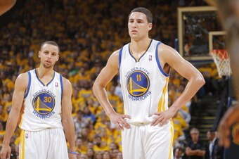 OAKLAND, CA - MAY 1: Stephen Curry #30 and Klay Thompson #11 of the Golden State Warriors in a game against the Los Angeles Clippers in Game Six of the Western Conference Quarterfinals during the 2014 NBA Playoffs at Oracle Arena on May 1, 2014 in Oakland