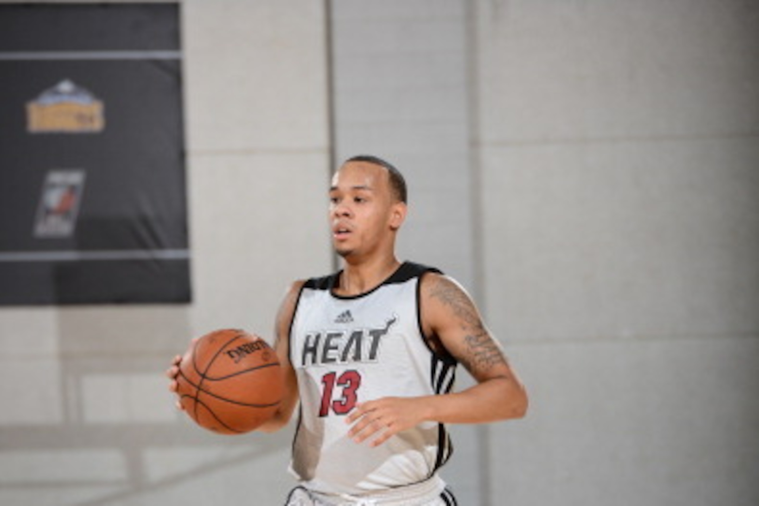 LAS VEGAS, NV - JULY 12: Shabazz Napier #13 of the Miami Heat handles the ball against the Houston Rockets on July 12, 2014 at Cox Pavilion in Las Vegas, Nevada. NOTE TO USER: User expressly acknowledges and agrees that, by downloading and or using this p LAS VEGAS, NV - JULY 12: Shabazz Napier #13 of the Miami Heat handles the ball against the Houston Rockets on July 12, 2014 at Cox Pavilion in Las Vegas, Nevada. NOTE TO USER: User expressly acknowledges and agrees that, by downloading and or using this p