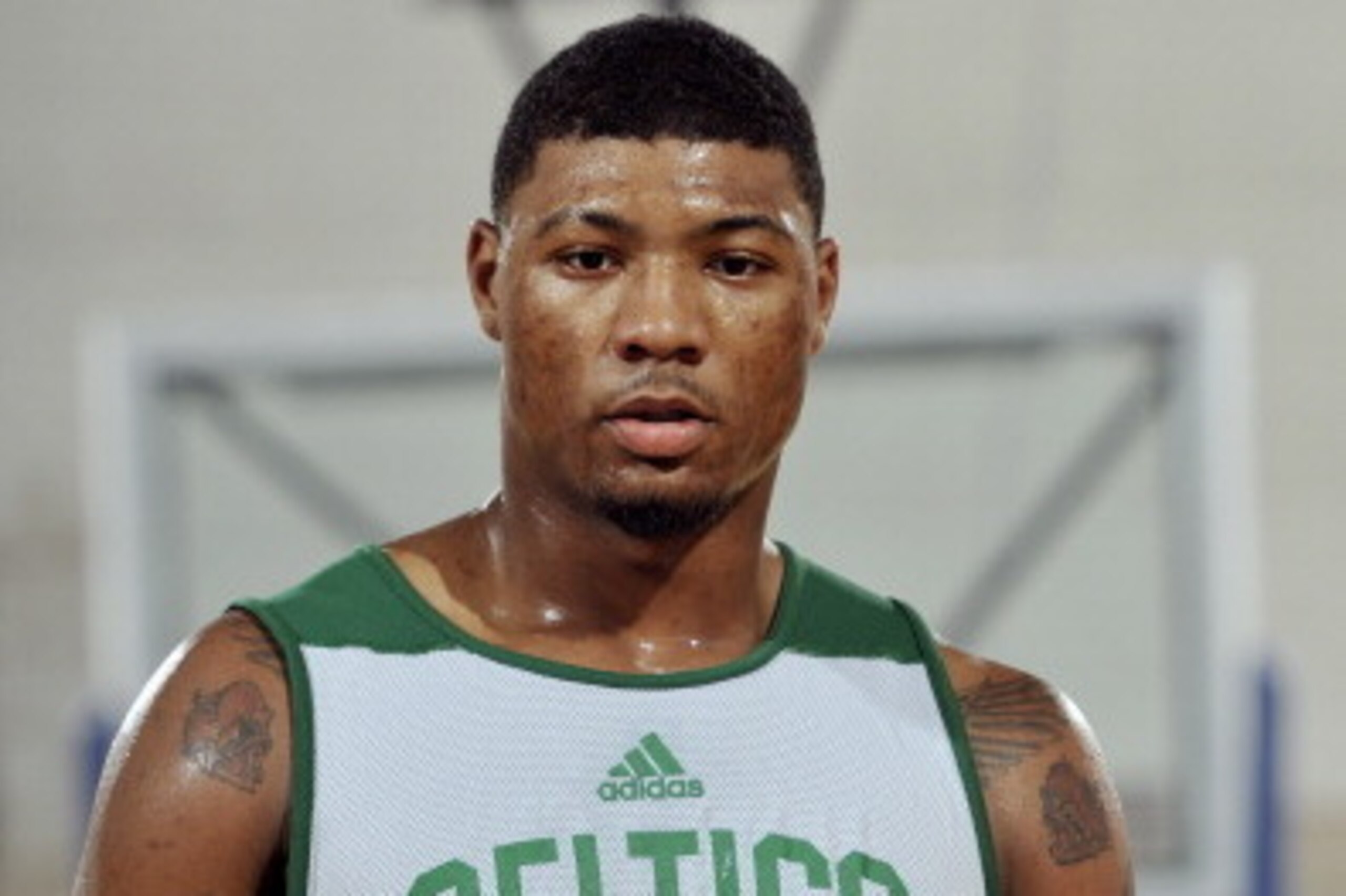 ORLANDO, FL - JULY 5: Marcus Smart #36 of the Boston Celtics stands on the court during a game against the Miami Heat on July 5, 2014 at Amway Center in Orlando, Florida. NOTE TO USER: User expressly acknowledges and agrees that, by downloading and or usi