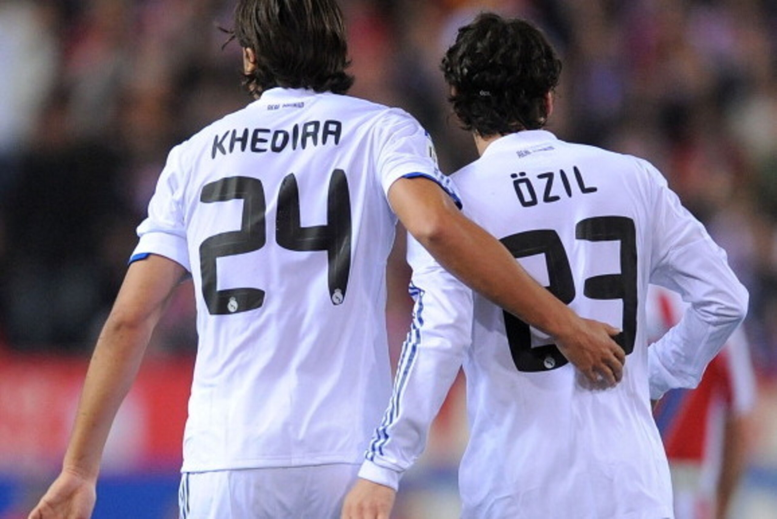 MADRID, SPAIN - MARCH 19:  Sami Khedira of Real Madrid celebrates with Mesut Ozil after Ozil scored Real's second goal during the La Liga match between Atletico Madrid and Real Madrid at Vicente Calderon Stadium on March 19, 2011 in Madrid, Spain.  (Photo