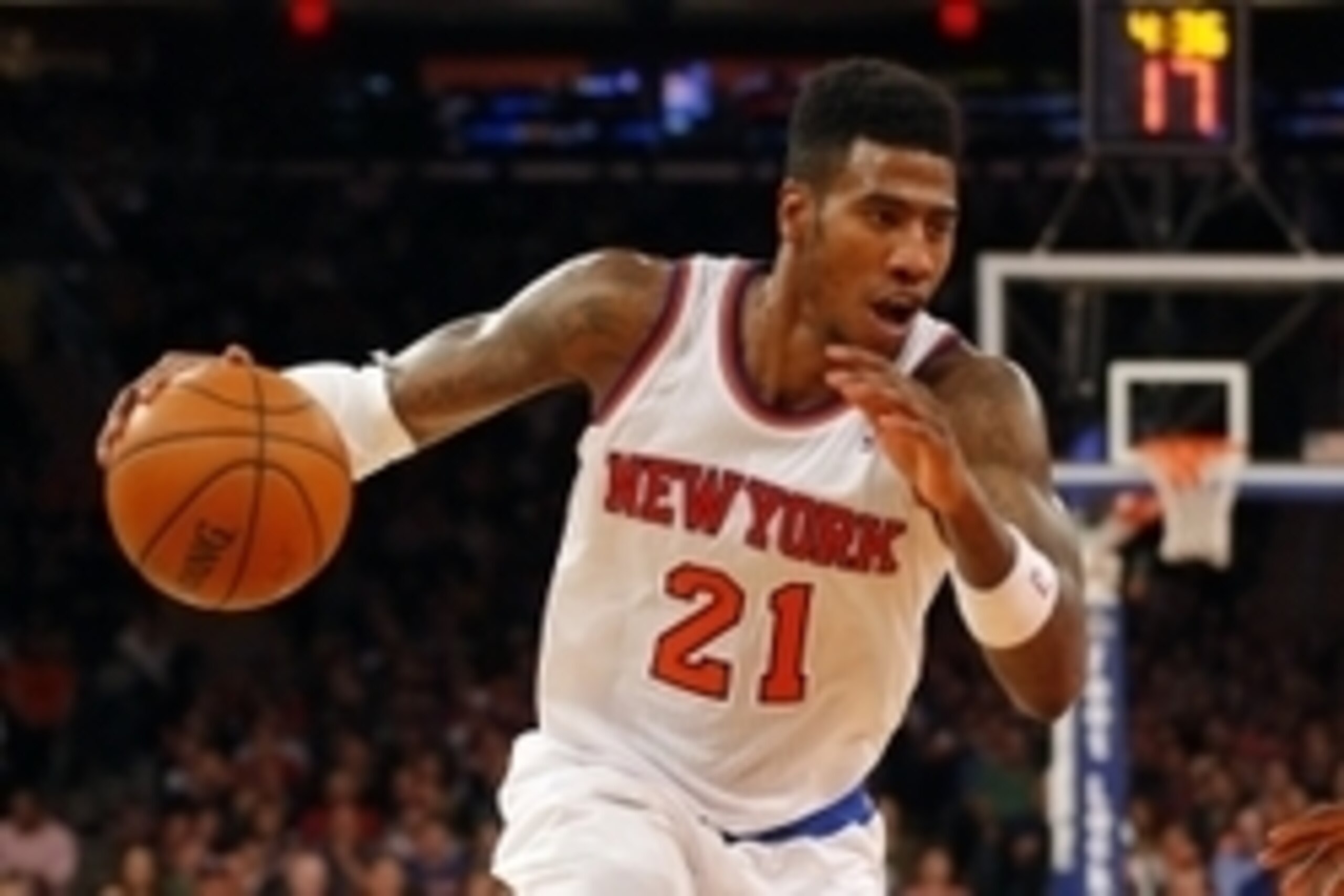Apr 13, 2014; New York, NY, USA;  New York Knicks guard Iman Shumpert (21) drives to the basket during the second half against the Chicago Bulls at Madison Square Garden. New York Knicks defeat the Chicago Bulls 100-89. Mandatory Credit: Jim O'Connor-USA 