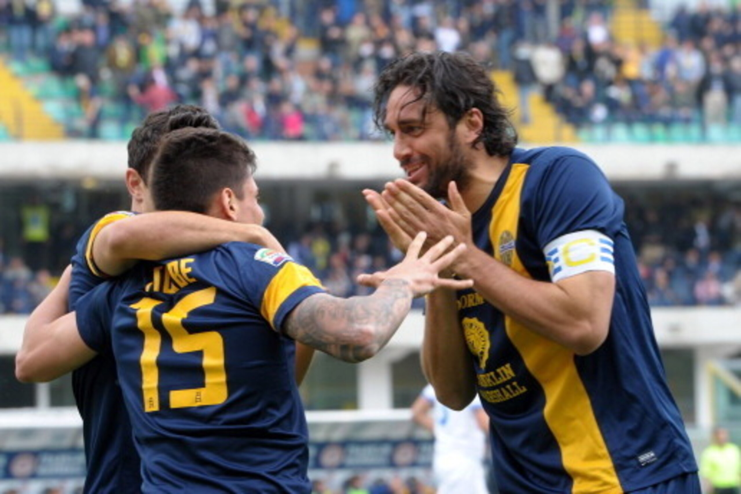 VERONA, ITALY - APRIL 27:  Luca Toni (R) of Hellas Verona celebrate with teams mate Iturbe Juam Manuel Arevalos after scoring his opening goal  during the Serie A match between Hellas Verona FC and Calcio Catania at Stadio Marc'Antonio Bentegodi on April 