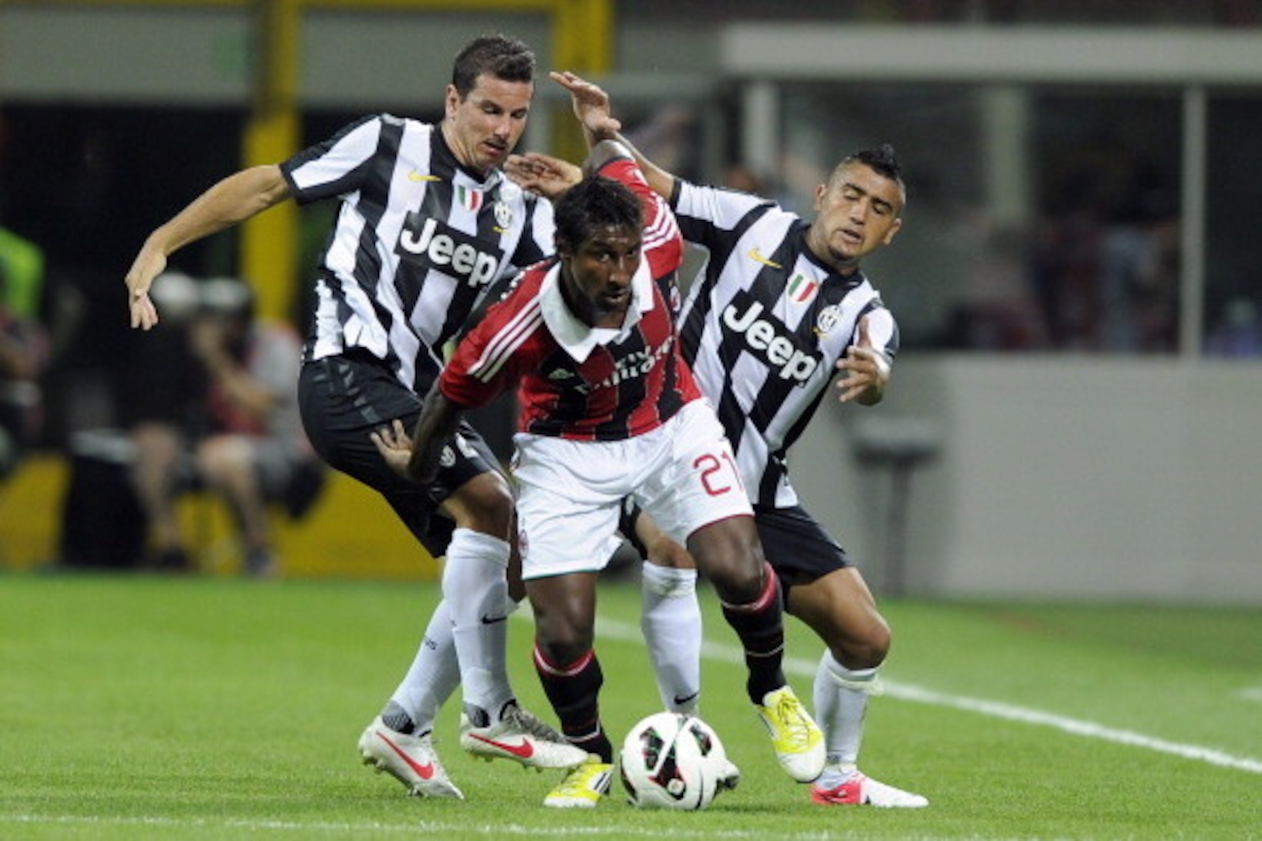 MILAN, ITALY - AUGUST 19:  Kevin Constant (C) of AC Milan during the Berlusconi Trophy match between AC Milan and Juventus FC at Stadio Giuseppe Meazza on August 19, 2012 in Milan, Italy.  (Photo by Claudio Villa/Getty Images)