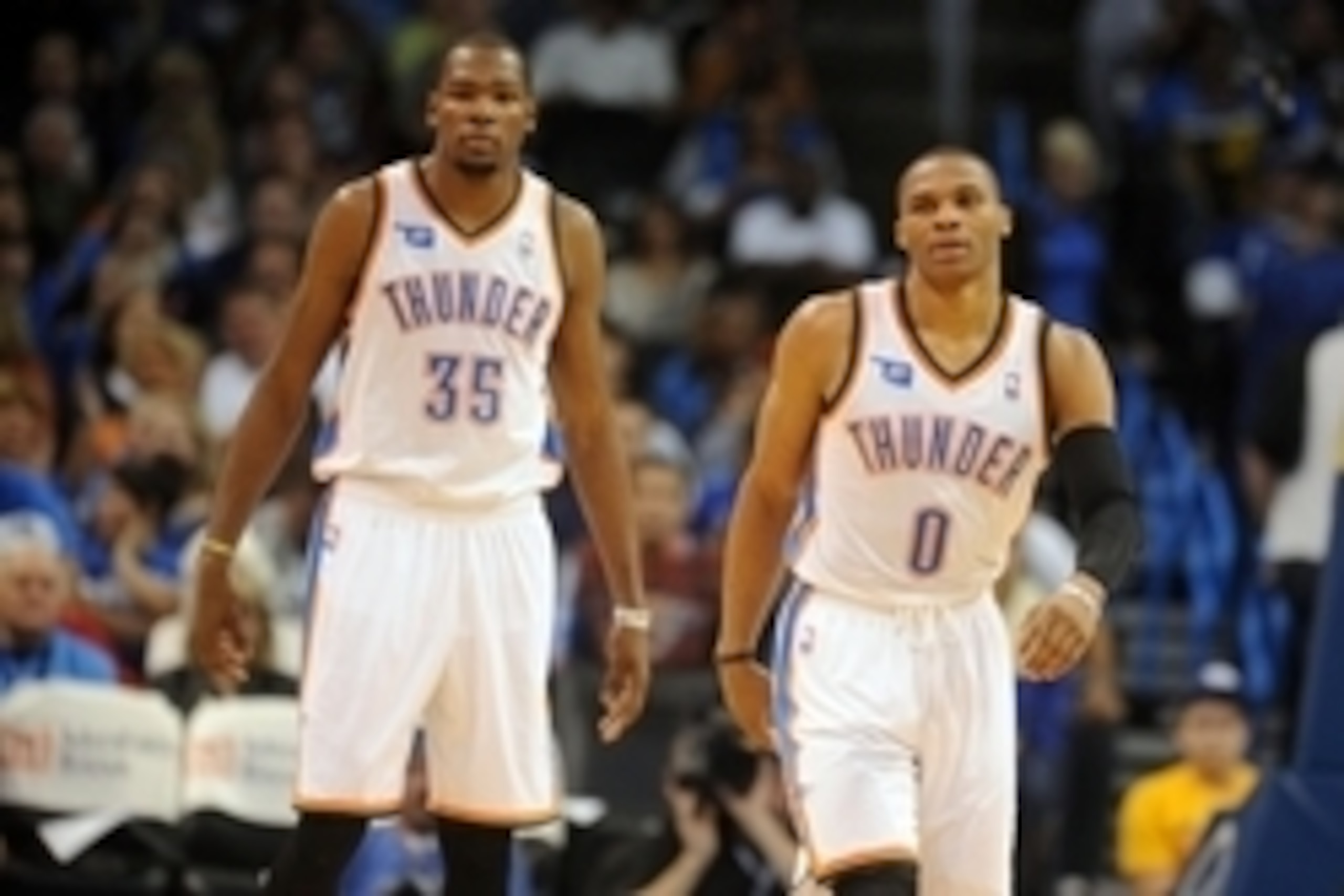 Nov 3, 2013; Oklahoma City, OK, USA; Oklahoma City Thunder small forward Kevin Durant (35) and Thunder point guard Russell Westbrook (0) react to a play in action against the Phoenix Suns during the fourth quarter at Chesapeake Energy Arena. Mandatory Cre