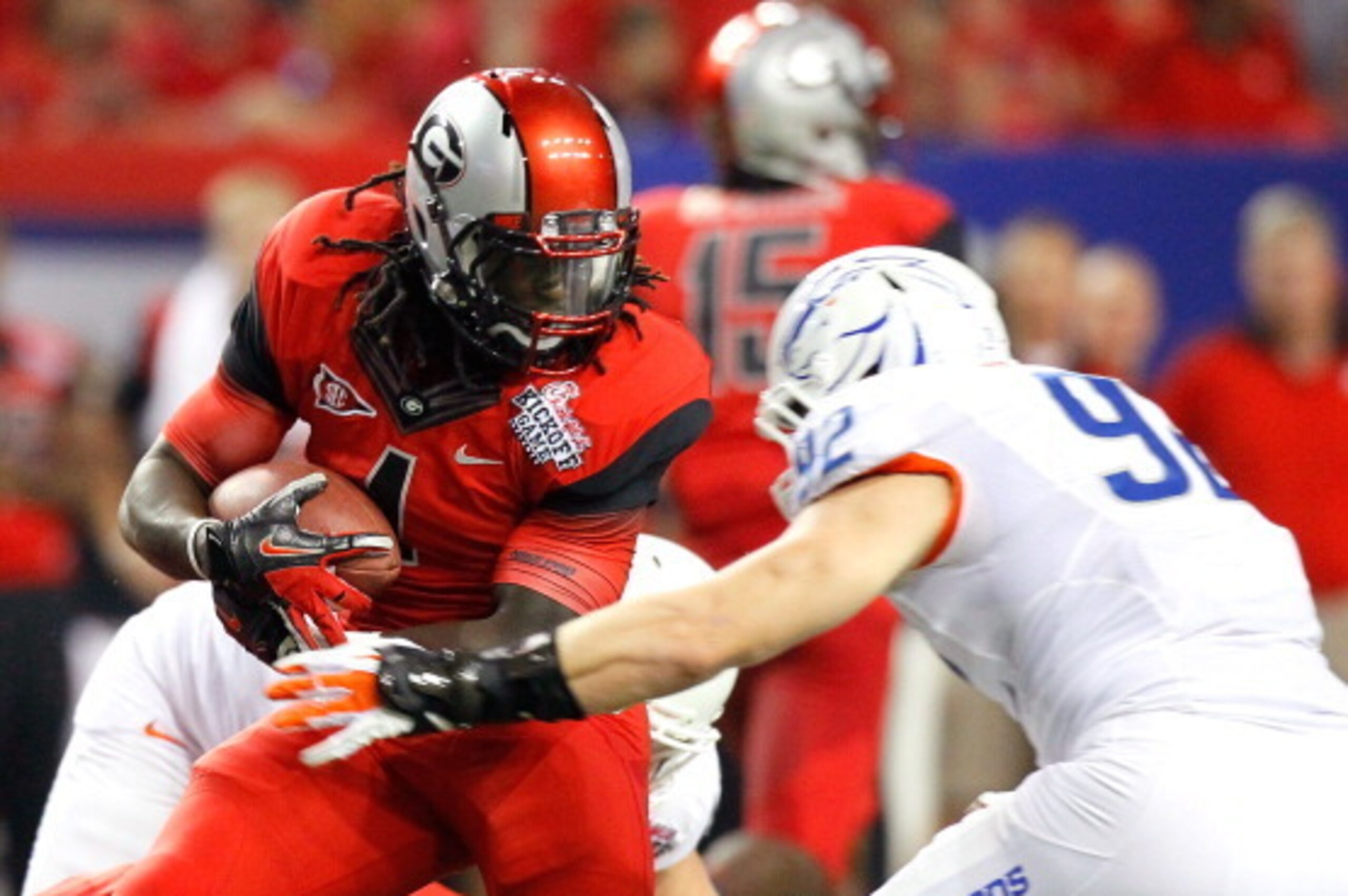 ATLANTA, GA - SEPTEMBER 03: Luis Capella #4 of the Georgia Bulldogs rushes against Shea McClellin #92 of the Boise State Broncos at Georgia Dome on September 3, 2011 in Atlanta, Georgia. (Photo by Kevin C. Cox/Getty Images) ATLANTA, GA - SEPTEMBER 03: Luis Capella #4 of the Georgia Bulldogs rushes against Shea McClellin #92 of the Boise State Broncos at Georgia Dome on September 3, 2011 in Atlanta, Georgia. (Photo by Kevin C. Cox/Getty Images)