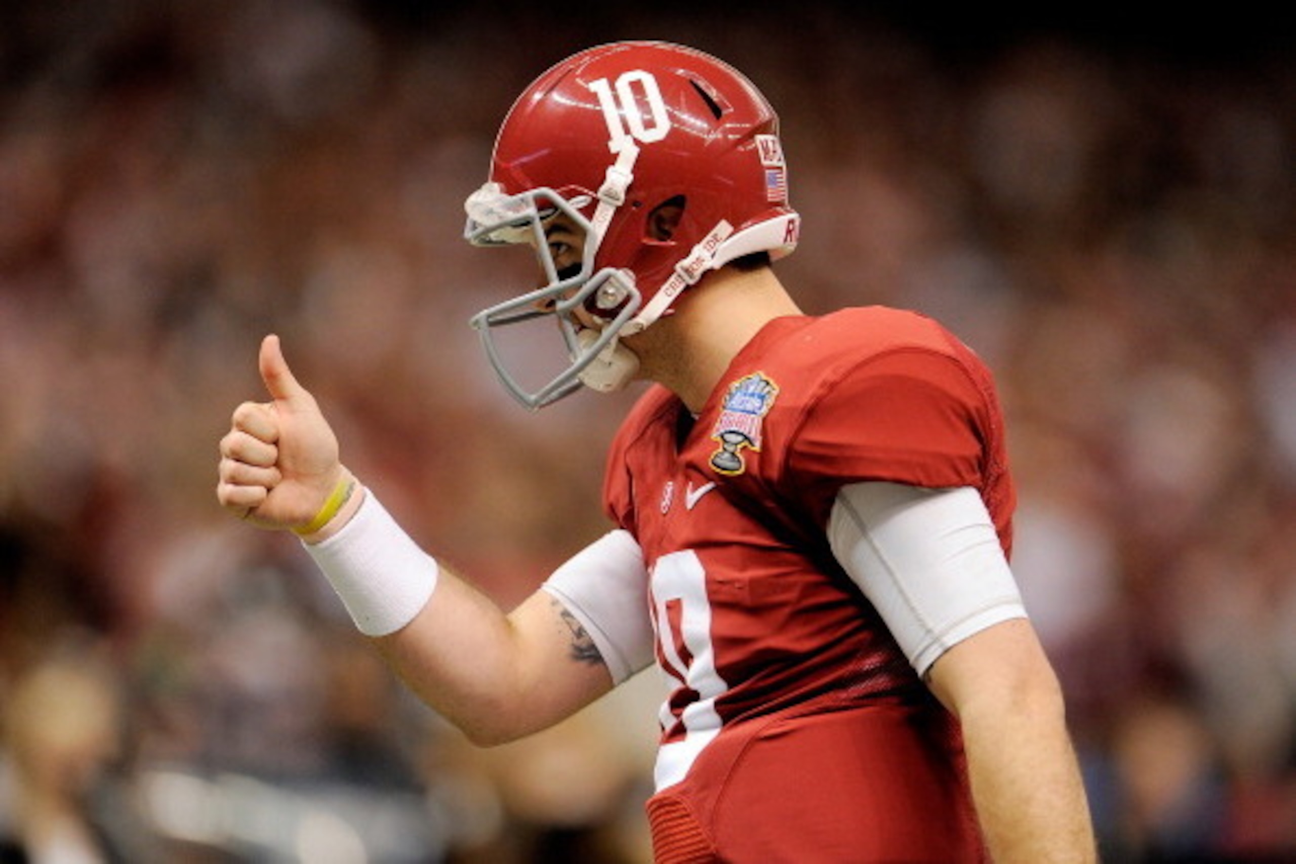 NEW ORLEANS, LA - JANUARY 02: AJ McCarron #10 of the Alabama Crimson Tide reacts against the Oklahoma Sooners during the Allstate Sugar Bowl at the Mercedes-Benz Superdome on January 2, 2014 in New Orleans, Louisiana. (Photo by Stacy Revere/Getty Images NEW ORLEANS, LA - JANUARY 02: AJ McCarron #10 of the Alabama Crimson Tide reacts against the Oklahoma Sooners during the Allstate Sugar Bowl at the Mercedes-Benz Superdome on January 2, 2014 in New Orleans, Louisiana. (Photo by Stacy Revere/Getty Images