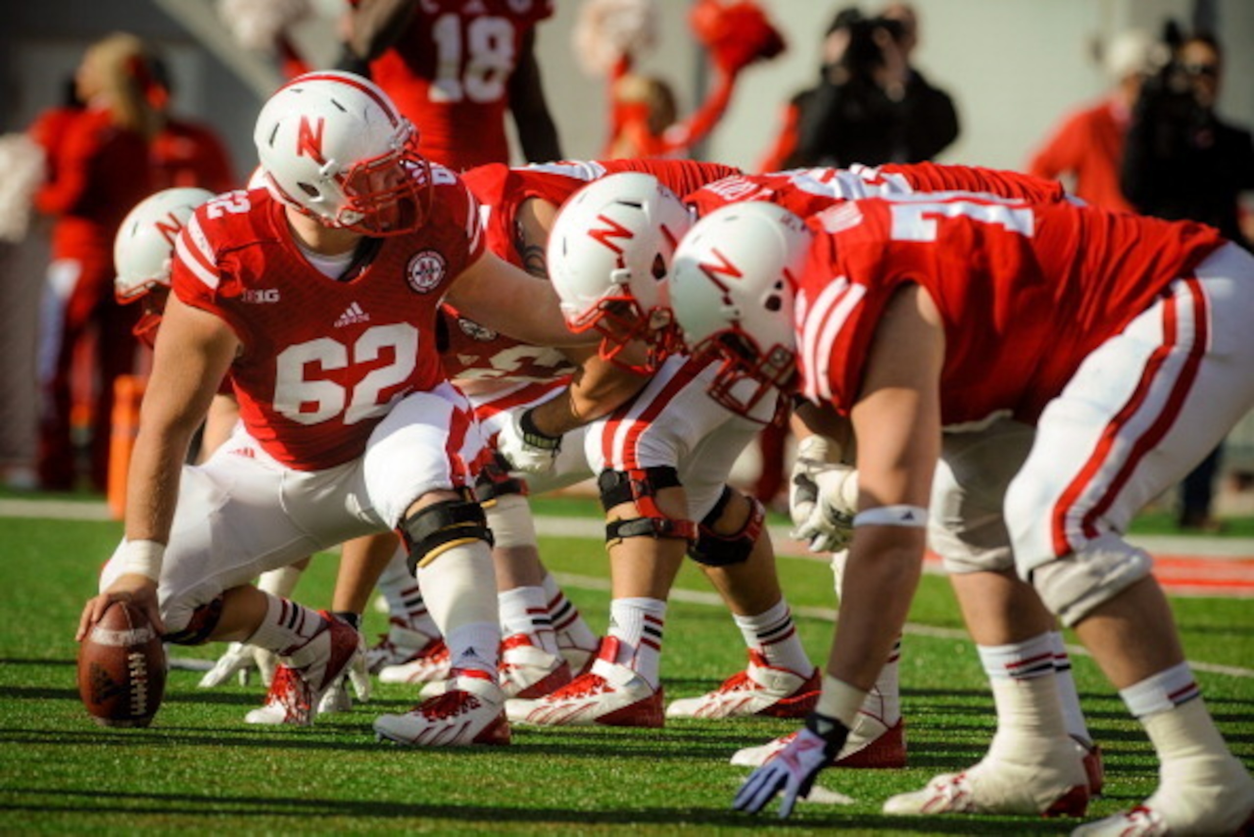 LINCOLN, NE - NOVEMBER 29: The Nebraska Cornhuskers offensive line during their game against the Iowa Hawkeyes at Memorial stadium on November 29, 2013 in Lincoln, Nebraska. (Photo by Eric Francis/Getty Images) LINCOLN, NE - NOVEMBER 29: The Nebraska Cornhuskers offensive line during their game against the Iowa Hawkeyes at Memorial stadium on November 29, 2013 in Lincoln, Nebraska. (Photo by Eric Francis/Getty Images)