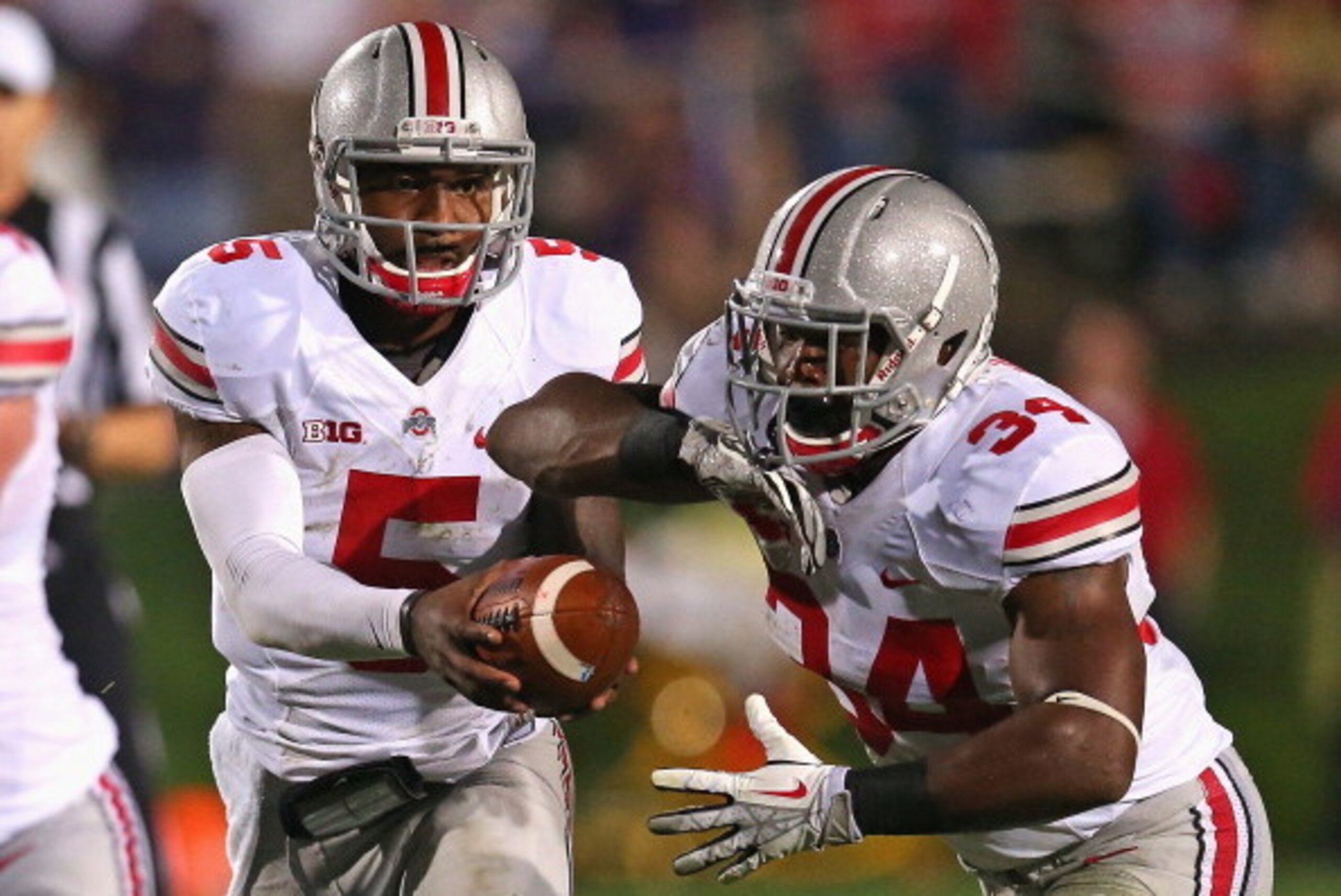EVANSTON, IL - OCTOBER 05: Braxton Miller #5 of the Ohio State Buckeyes hands off to Carlos Hyde #34 against the Northwestern Wildcats at Ryan Field on October 5, 2013 in Evanston, Illinois. Ohio State defeated Northwestern 40-30. Photo by Jonathan Daniel EVANSTON, IL - OCTOBER 05: Braxton Miller #5 of the Ohio State Buckeyes hands off to Carlos Hyde #34 against the Northwestern Wildcats at Ryan Field on October 5, 2013 in Evanston, Illinois. Ohio State defeated Northwestern 40-30. Photo by Jonathan Daniel