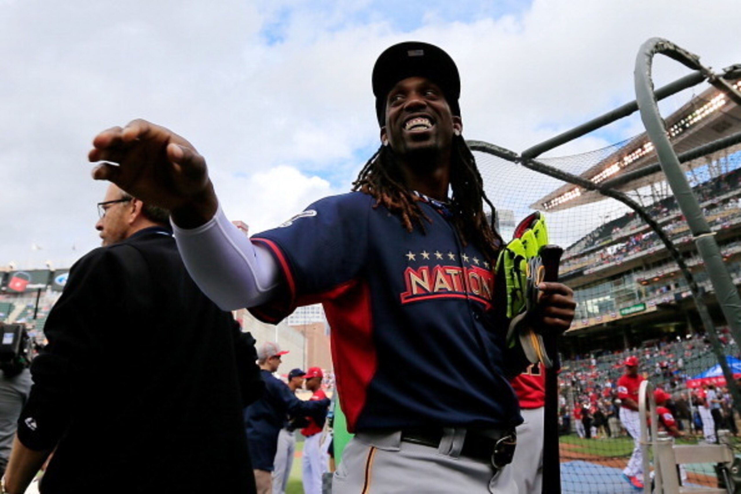 MINNEAPOLIS, MN - JULY 14:  Andrew McCutchen of the Pittsburgh Pirates takes the field during the Gatorade All-Star Workout Day at Target Field on July 14, 2014 in Minneapolis, Minnesota.  (Photo by Rob Carr/Getty Images)