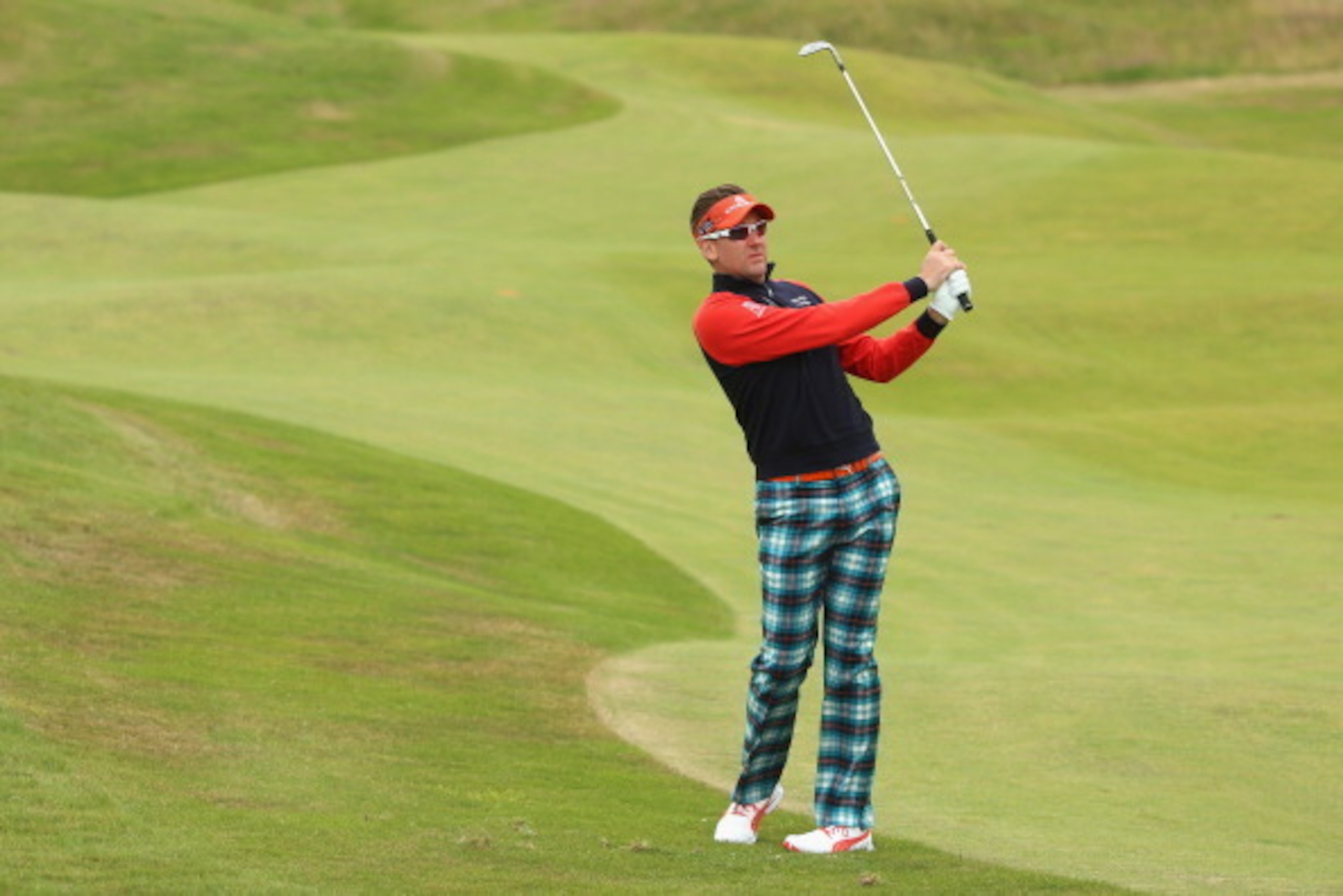 ABERDEEN, SCOTLAND - JULY 10:  Ian Poulter of England in action on the second hole during the first round of the Aberdeen Asset Management Scottish Open at Royal Aberdeen on July 10, 2014 in Aberdeen, Scotland.  (Photo by Andrew Redington/Getty Images)