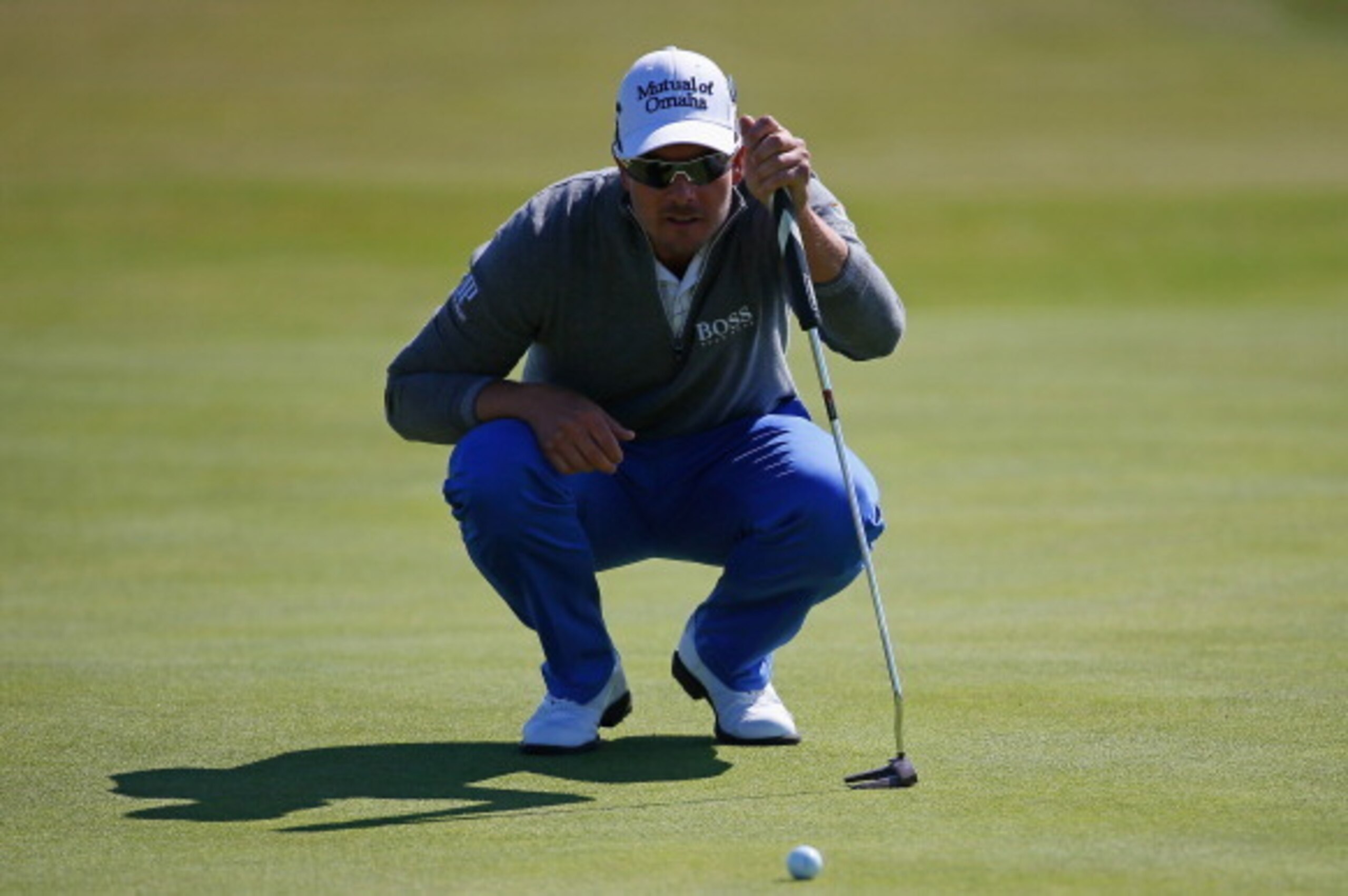 HOYLAKE, ENGLAND - JULY 15:  Henrik Stenson of Sweden lines up a putt during a practice round prior to the start of The 143rd Open Championship at Royal Liverpool on July 15, 2014 in Hoylake, England.  (Photo by Tom Pennington/Getty Images)