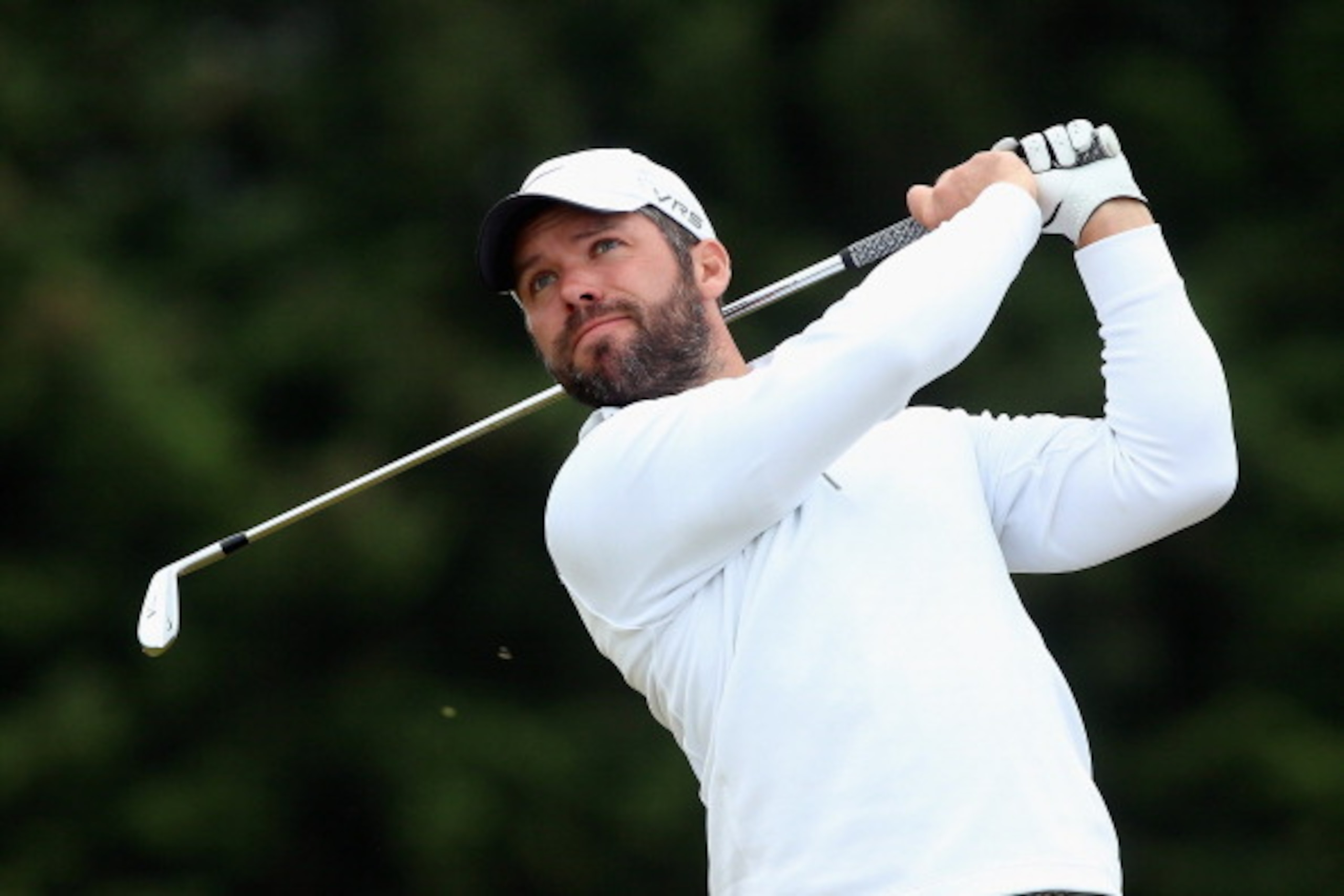 ABERDEEN, SCOTLAND - JULY 13:  Paul Casey of England hits hs tee-shot on the 17th hole during the final round of the Aberdeen Asset Management Scottish Open at Royal Aberdeen on July 13, 2014 in Aberdeen, Scotland.  (Photo by Andrew Redington/Getty Images