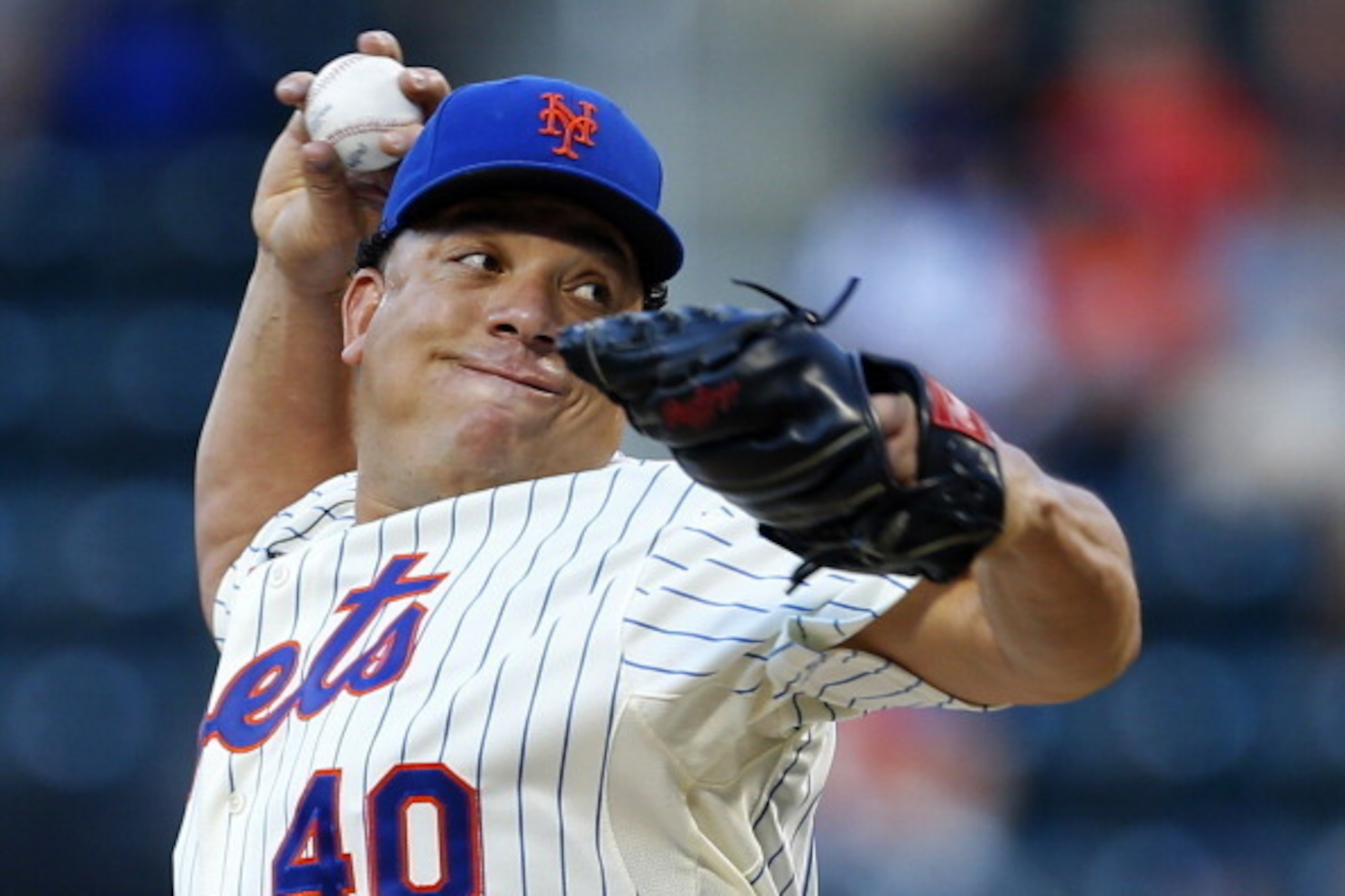NEW YORK, NY - JULY 05: Bartolo Colon #40 of the New York Mets delivers a pitch against the Texas Rangers during the first inning on July 5, 2014 at Citi Field in the Flushing neighborhood of the Queens borough of New York City. (Photo by Rich Schultz/Get