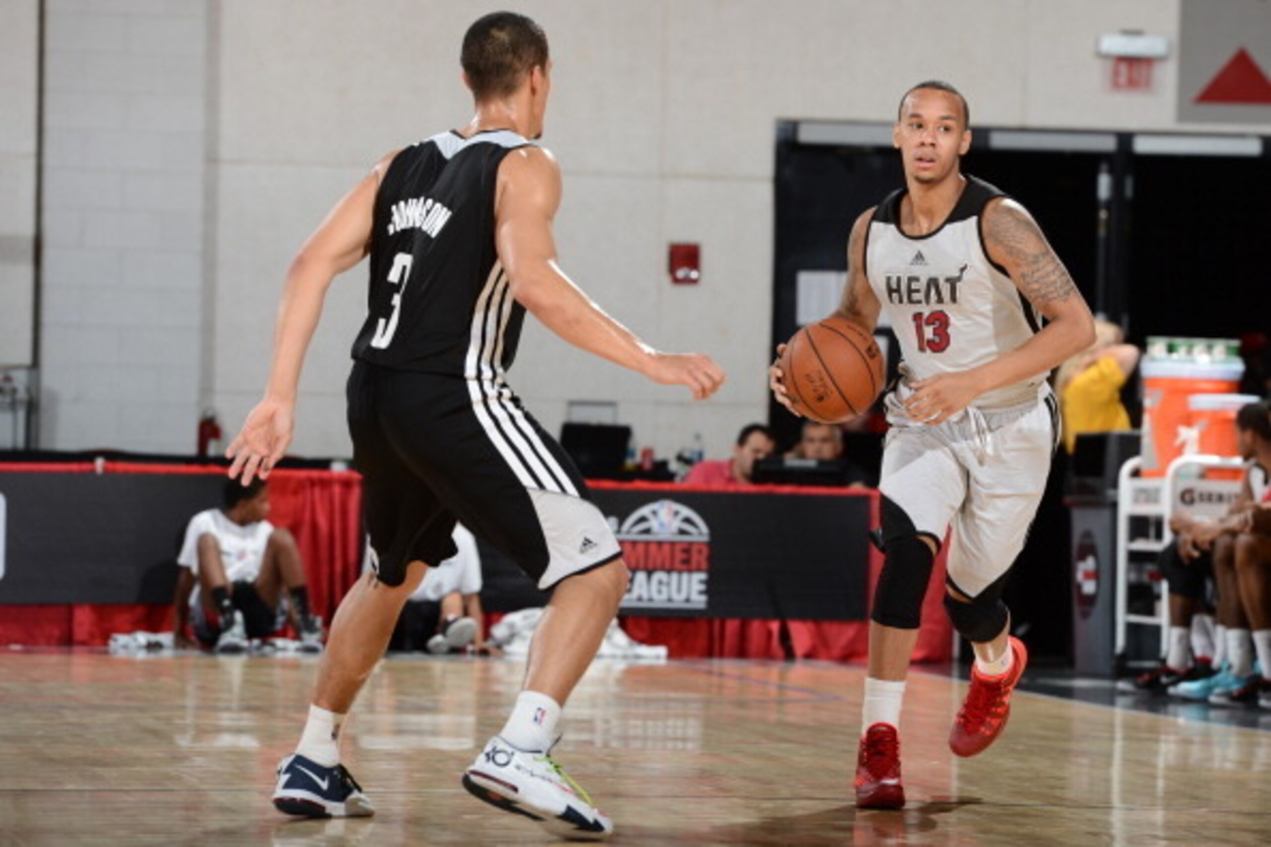 LAS VEGAS, NV - JULY 12: Shabazz Napier #13 of the Miami Heat handles the ball against the Houston Rockets at the Samsung NBA Summer League 2014 on July 12, 2014 at the Cox Pavilion in Las Vegas, Nevada. NOTE TO USER: User expressly acknowledges and agree