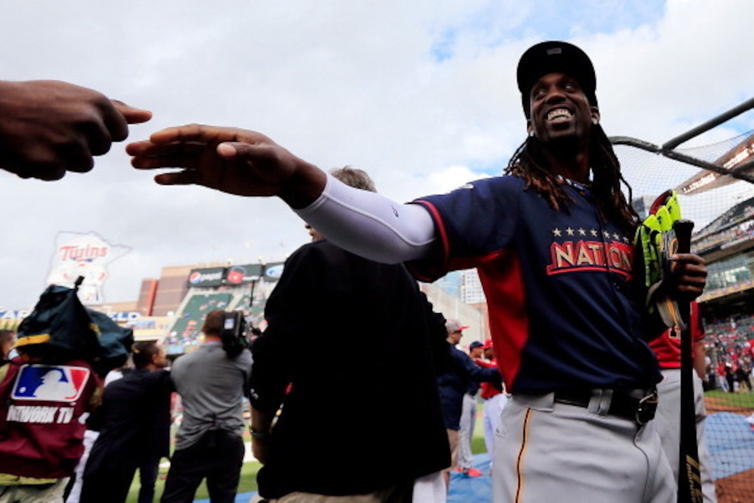MINNEAPOLIS, MN - JULY 14:  Andrew McCutchen of the Pittsburgh Pirates takes the field during the Gatorade All-Star Workout Day at Target Field on July 14, 2014 in Minneapolis, Minnesota.  (Photo by Rob Carr/Getty Images)
