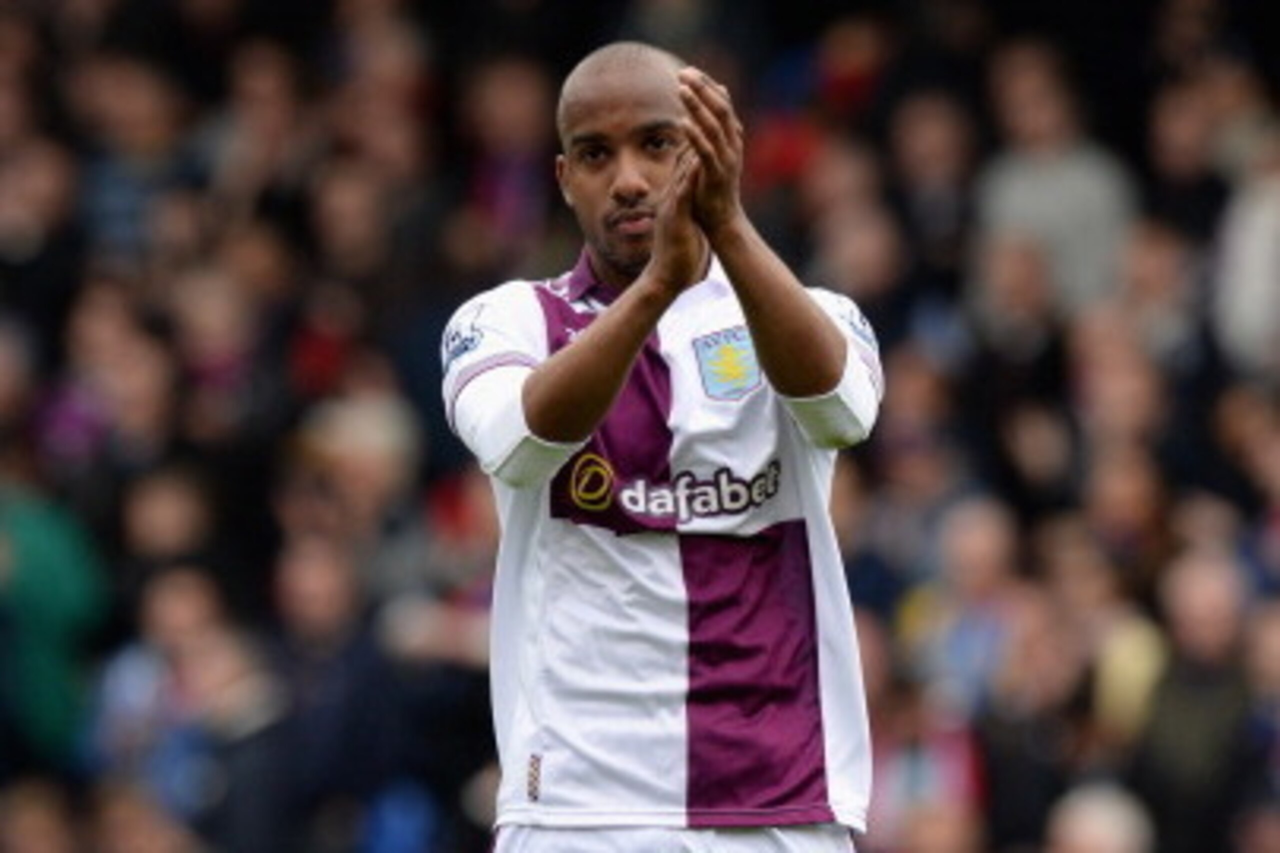 LONDON, ENGLAND - APRIL 12: Fabian Delph of Aston Villa applauds the fans after losing to Crystal Palace at the end of the Barclays Premier League match between Crystal Palace and Aston Villa at Selhurst Park on April 12, 2014 in London, England.  (Photo 