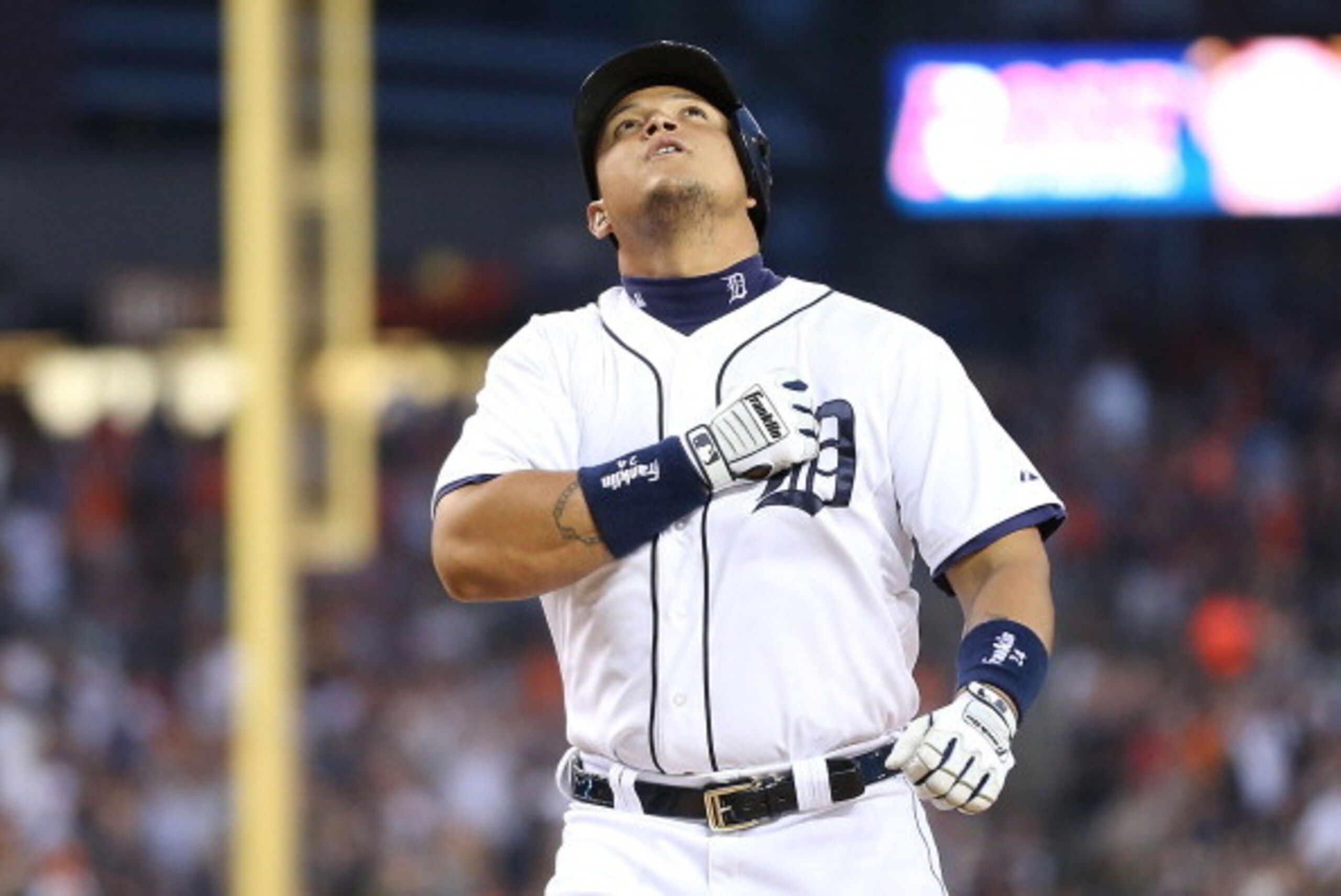 DETROIT, MI - JUNE 30:  Miguel Cabrera #24 of the Detroit Tigers celebrates after hitting a solo home run to left center field during the sixth inning of the game against the Oakland Athletics at Comerica Park on June 30, 2014 in Detroit, Michigan.  (Phot