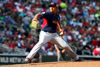 MINNEAPOLIS, MN - JULY 13: Julio Urias of the World Team pitches against the U.S. Team during the SiriusXM All-Star Futures Game at Target Field on July 13, 2014 in Minneapolis, Minnesota. (Photo by Elsa/Getty Images) MINNEAPOLIS, MN - JULY 13: Julio Urias of the World Team pitches against the U.S. Team during the SiriusXM All-Star Futures Game at Target Field on July 13, 2014 in Minneapolis, Minnesota. (Photo by Elsa/Getty Images)