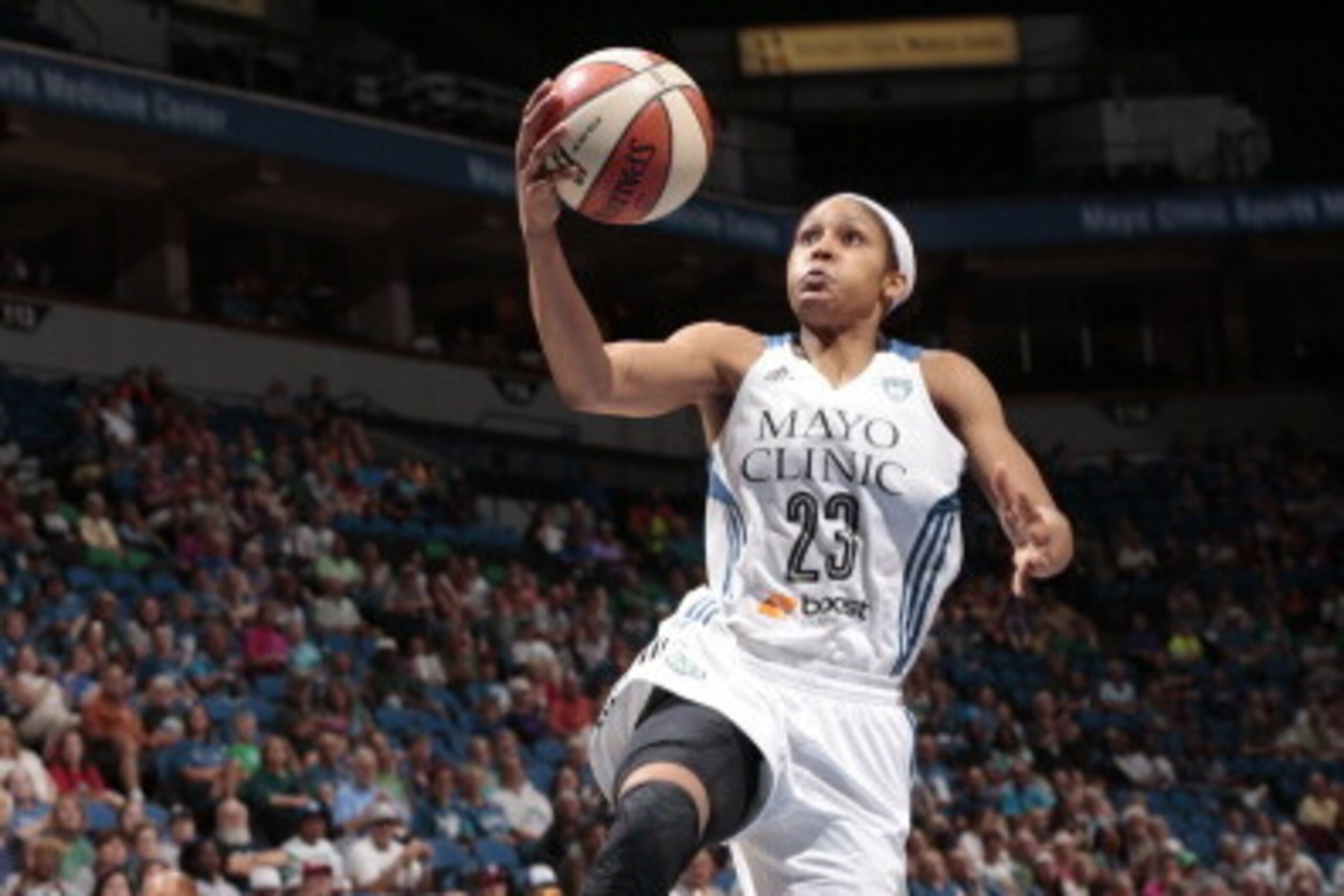 MINNEAPOLIS, MN - JULY 13: Maya Moore #23 of the Minnesota Lynx goes for the shot against the Seattle Storm during the WNBA game on July 13, 2014 at Target Center in Minneapolis, Minnesota.  NOTE TO USER: User expressly acknowledges and agrees that, by do