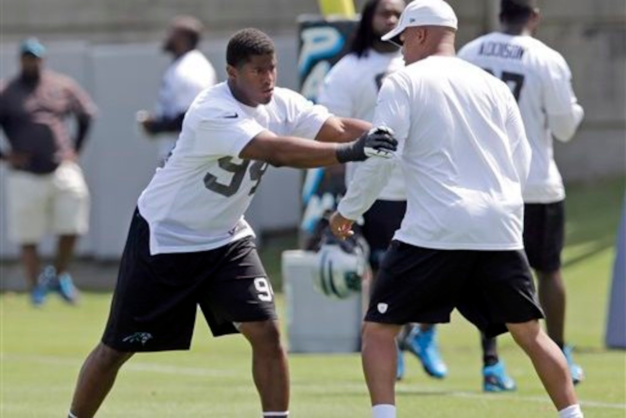 Rookie Kony Ealy works on his technique during OTAs.