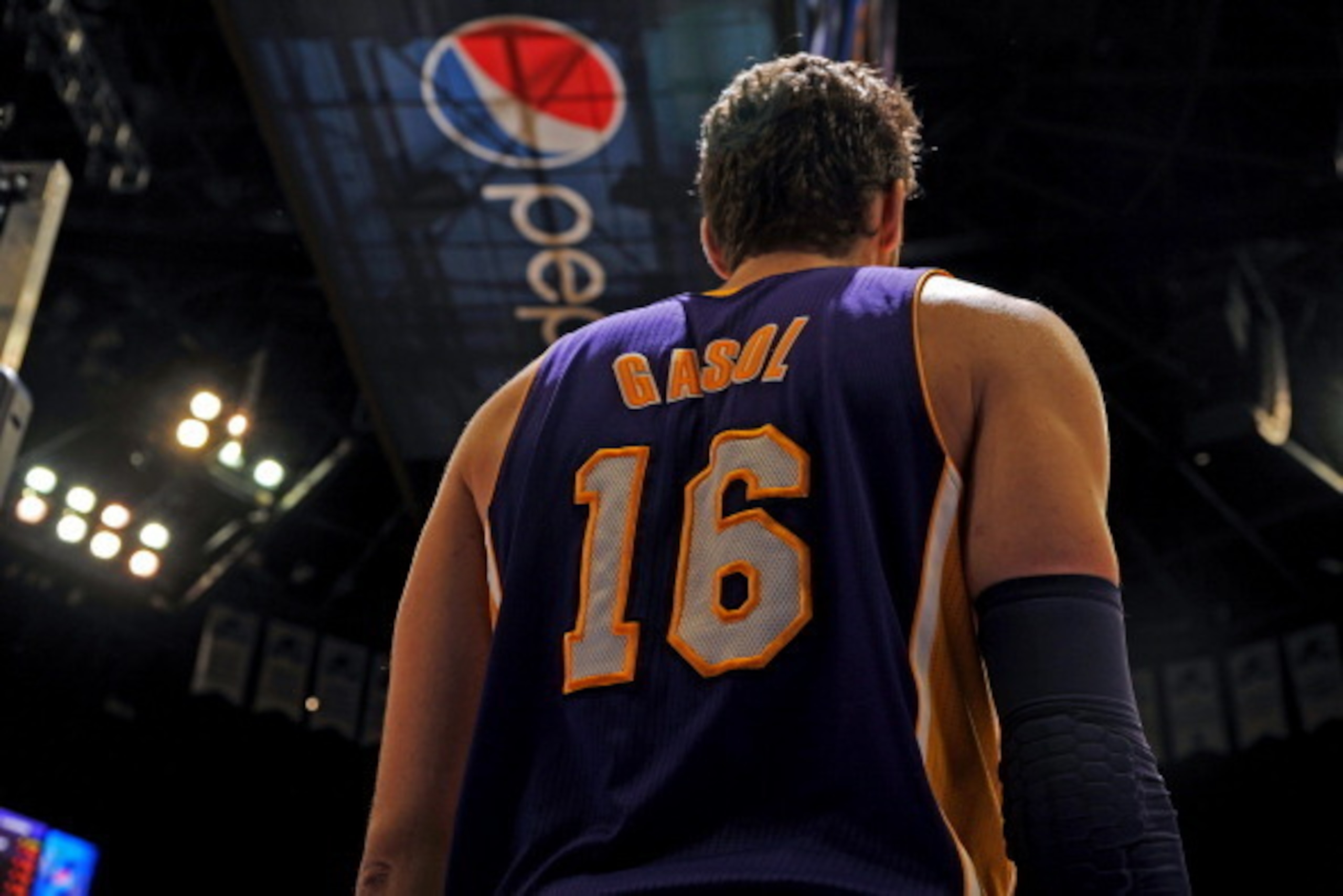 DENVER, CO - March 7: Pau Gasol #16 of the Los Angeles Lakers stands on the court during a game against the Denver Nuggets on March 7, 2014 at the Pepsi Center in Denver, Colorado. NOTE TO USER: User expressly acknowledges and agrees that, by downloading DENVER, CO - March 7: Pau Gasol #16 of the Los Angeles Lakers stands on the court during a game against the Denver Nuggets on March 7, 2014 at the Pepsi Center in Denver, Colorado. NOTE TO USER: User expressly acknowledges and agrees that, by downloading
