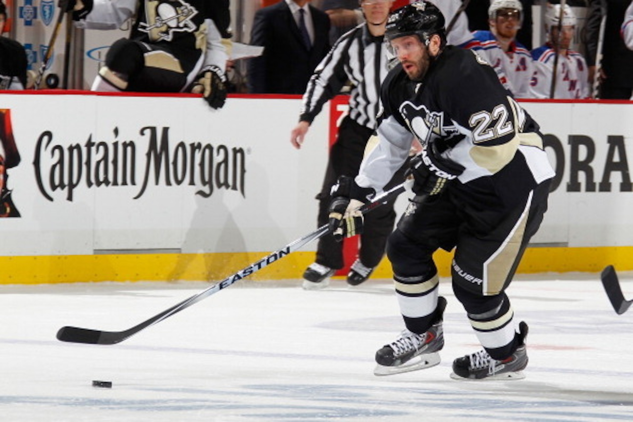 PITTSBURGH, PA - MAY 4:  Lee Stempniak #22 of the Pittsburgh Penguins moves the puck against the New York Rangers in Game Two of the Second Round of the 2014 Stanley Cup Playoffs at Consol Energy Center on May 4, 2014 in Pittsburgh, Pennsylvania.  (Photo 
