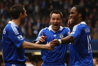 LONDON, ENGLAND - APRIL 11:  Frank Lampard, John Terry and Didier Drogba of Chelsea celebrate their team's second goal scored by Drogba during the Barclays Premier League match between Chelsea and Bolton Wanderers at Stamford Bridge on April 11, 2009 in L
