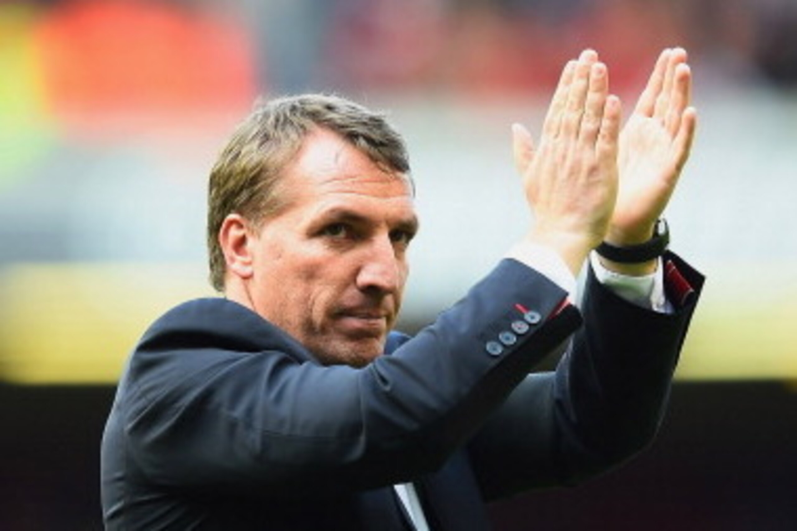 LIVERPOOL, ENGLAND - MAY 11:  Brendan Rodgers manager of Liverpool applauds the crowd after the Barclays Premier League match between Liverpool and Newcastle United at Anfield on May 11, 2014 in Liverpool, England. Liverpool finish as runners-up in the Pr