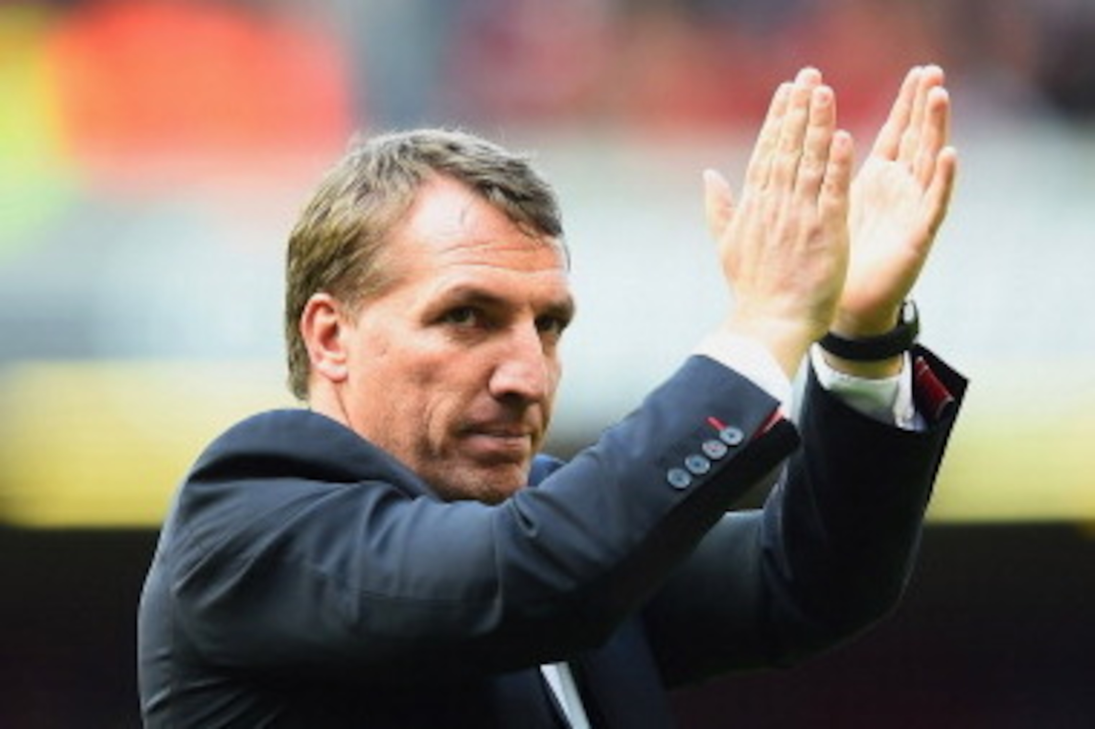 LIVERPOOL, ENGLAND - MAY 11:  Brendan Rodgers manager of Liverpool applauds the crowd after the Barclays Premier League match between Liverpool and Newcastle United at Anfield on May 11, 2014 in Liverpool, England. Liverpool finish as runners-up in the Pr
