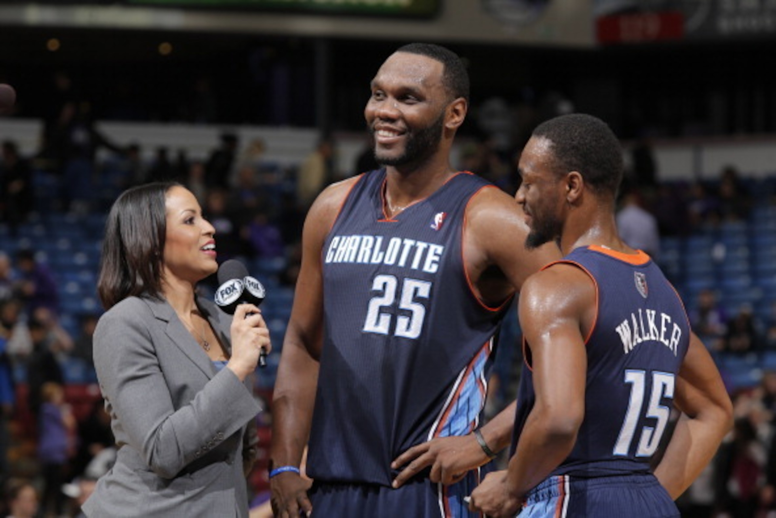 SACRAMENTO, CA - JANUARY 4: Al Jefferson #25 and Kemba Walker #15 of the Charlotte Bobcats are interviewed after defeating the Sacramento Kings on January 4, 2014 at Sleep Train Arena in Sacramento, California. NOTE TO USER: User expressly acknowledges an SACRAMENTO, CA - JANUARY 4: Al Jefferson #25 and Kemba Walker #15 of the Charlotte Bobcats are interviewed after defeating the Sacramento Kings on January 4, 2014 at Sleep Train Arena in Sacramento, California. NOTE TO USER: User expressly acknowledges an