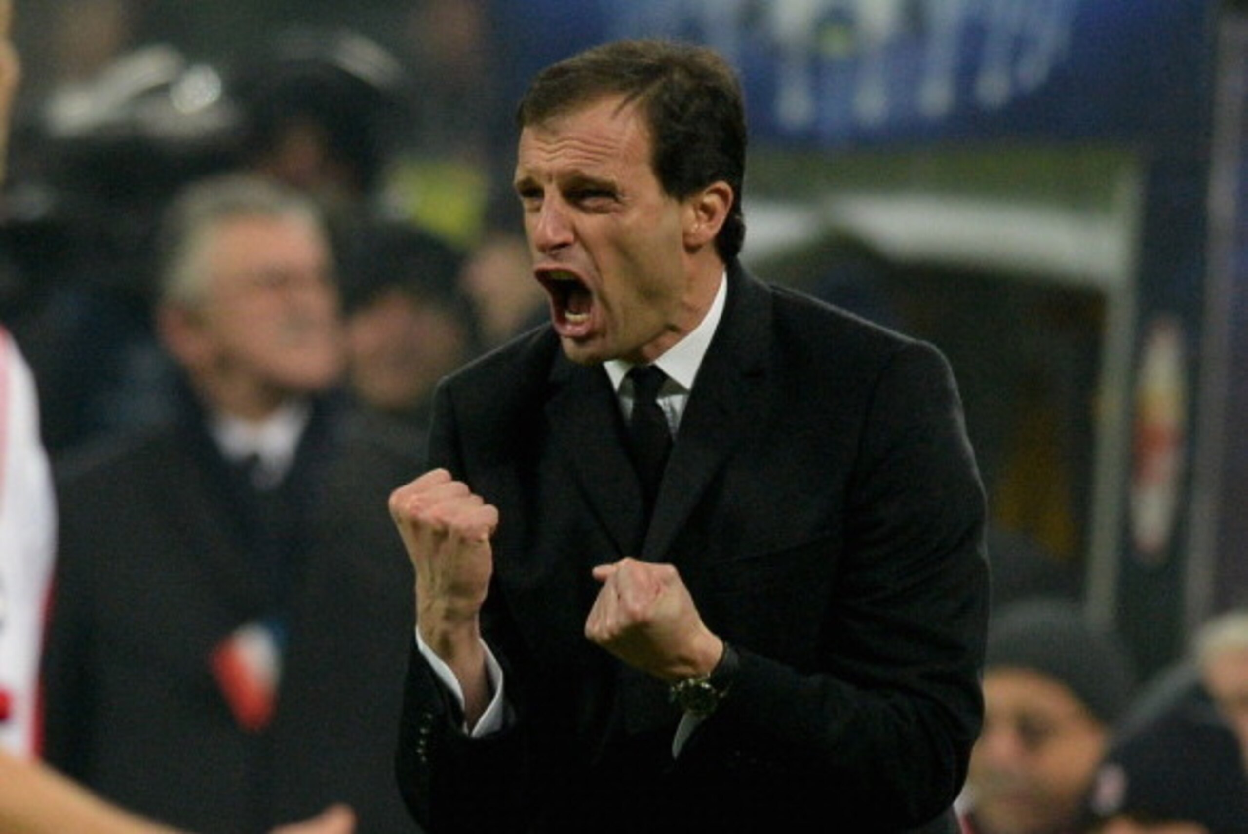 MILAN, ITALY - DECEMBER 11:  Head coach AC Milan Massimiliano Allegri reacts during the UEFA Champions League Group H match between AC Milan and Ajax Amsterdam at Stadio Giuseppe Meazza on December 11, 2013 in Milan, Italy.  (Photo by Claudio Villa/Getty