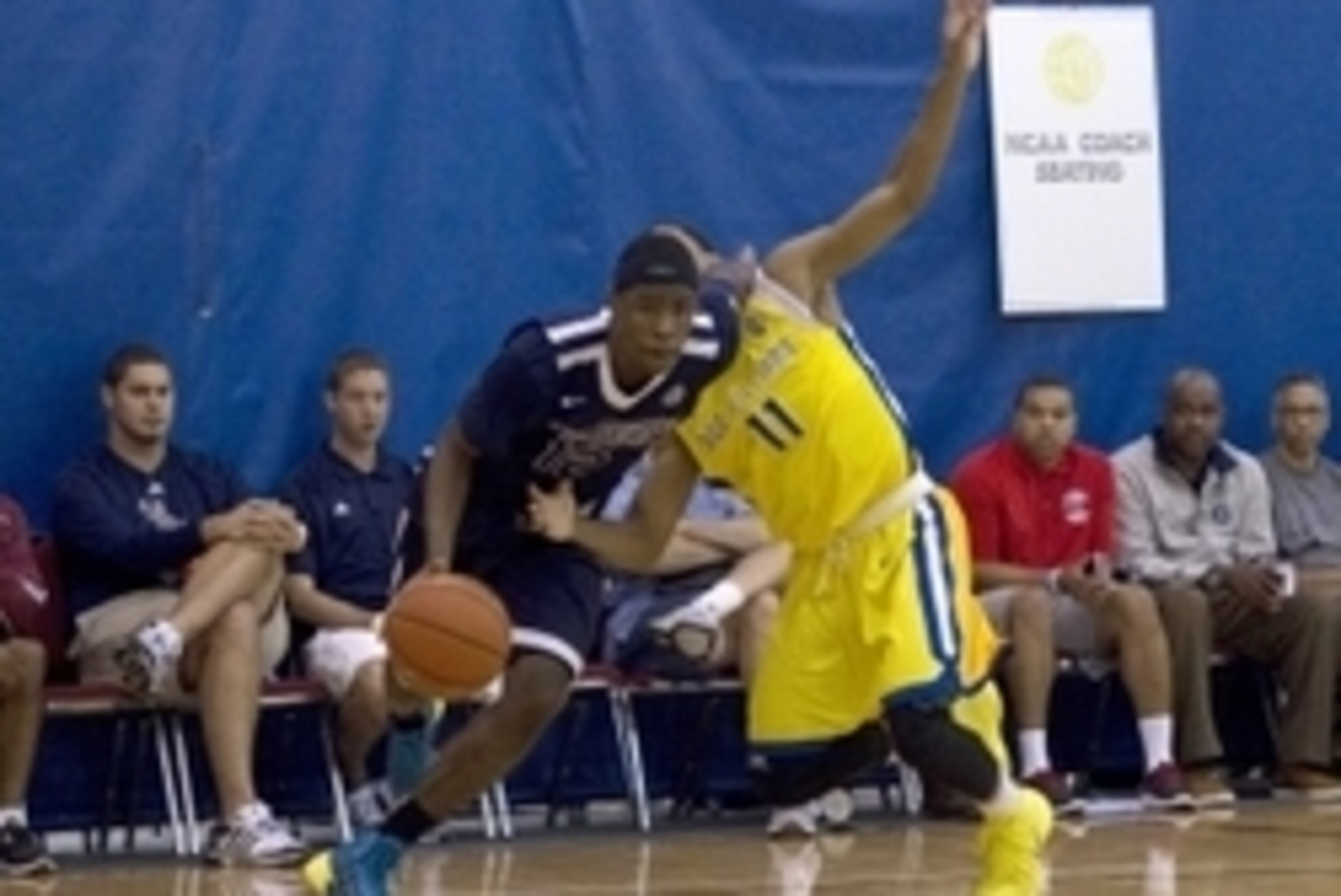 Jul 13, 2013; North Augusta, SC, USA; Jackson Tigers player Malik Newman (12) fouls Boo Williams player Marc Evans (11) during the Nike Peach Jam at the Riverview Park Activities Center. Mandatory Credit: Joshua S. Kelly-USA TODAY Sports Jul 13, 2013; North Augusta, SC, USA; Jackson Tigers player Malik Newman (12) fouls Boo Williams player Marc Evans (11) during the Nike Peach Jam at the Riverview Park Activities Center. Mandatory Credit: Joshua S. Kelly-USA TODAY Sports