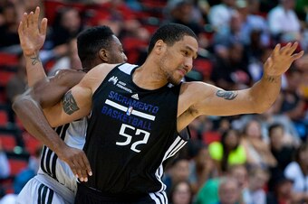 Dwayne Jones battles for inside position in NBA Summer League game against San Antonio.